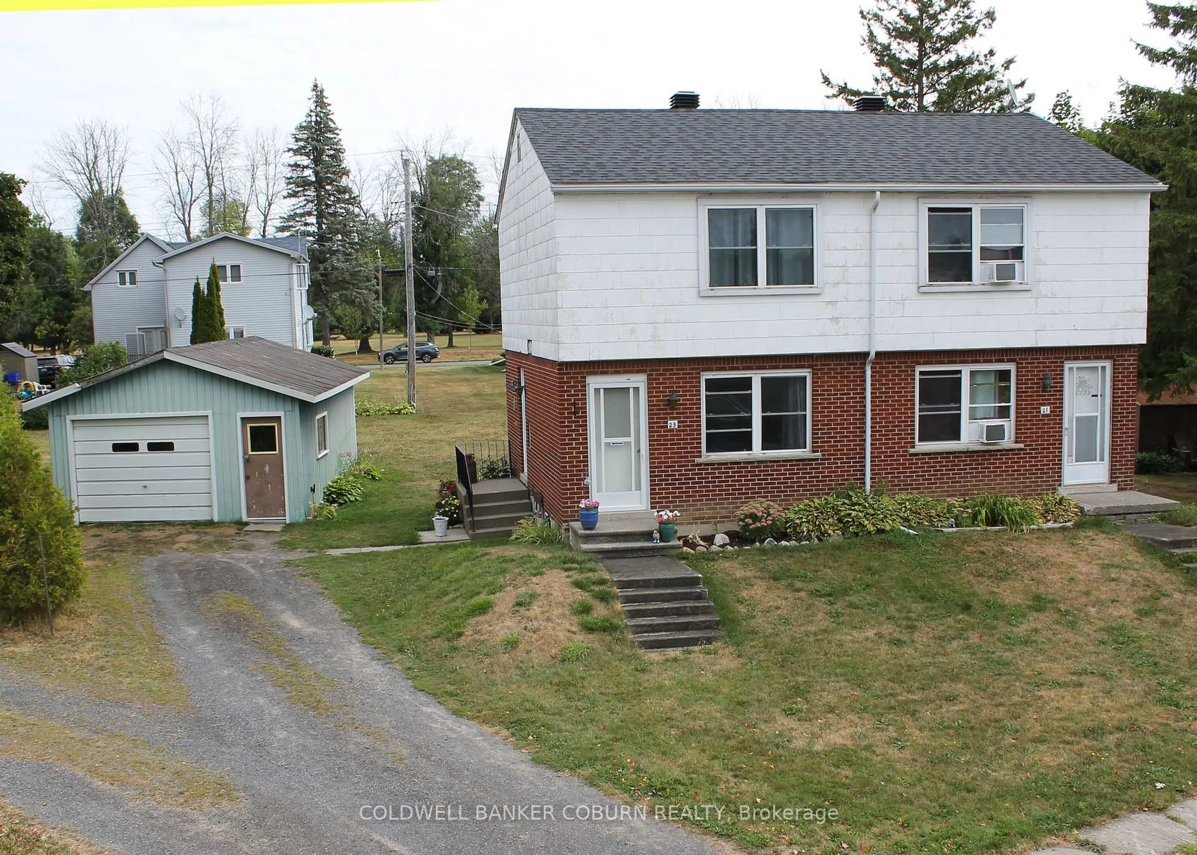 A pic from outside/outdoor area/front of a property/back of a property/a pic from drone, unknown for 21-23 Casselman Rd, South Dundas Ontario K0C 1X0