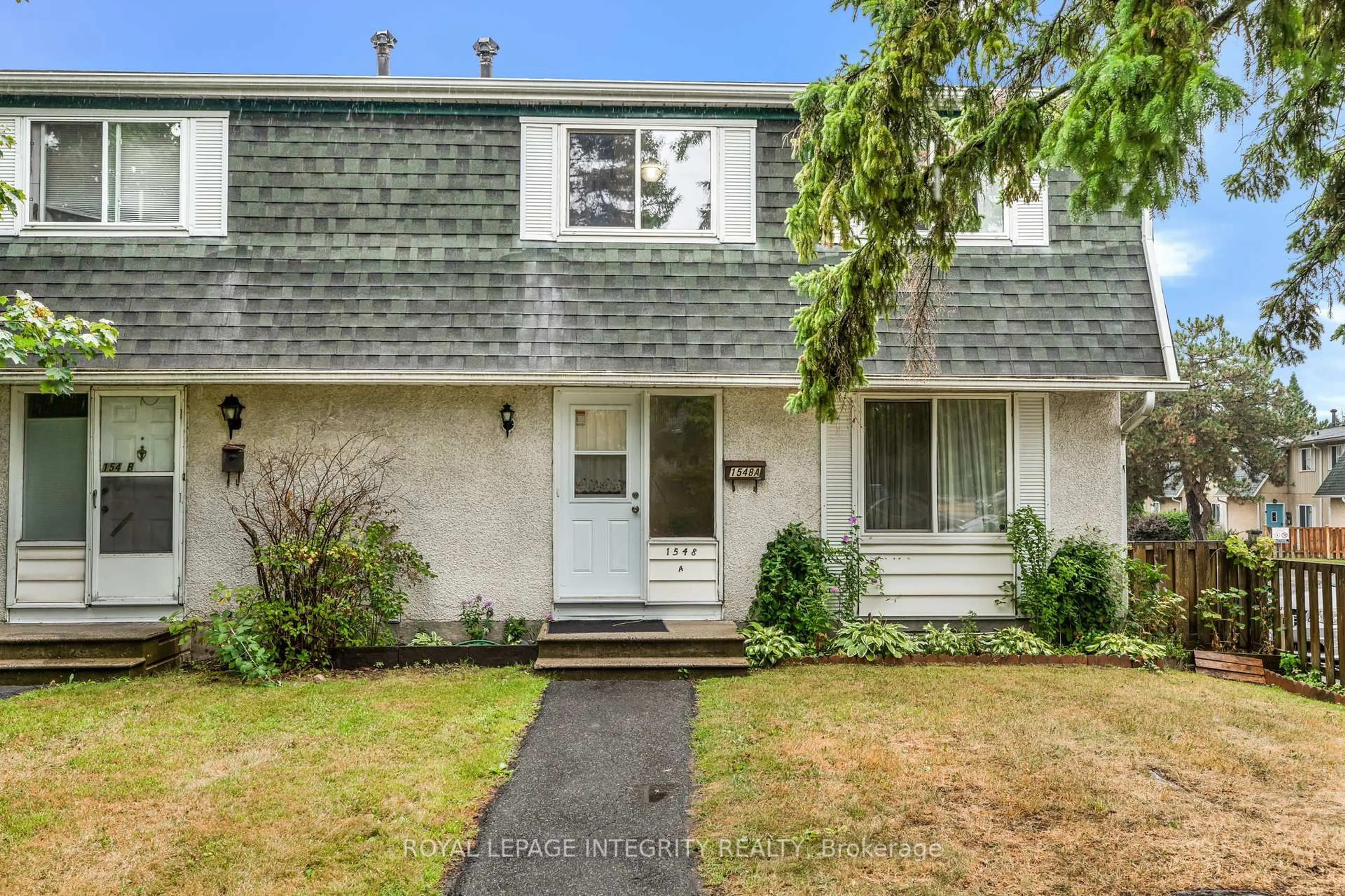 Home with vinyl exterior material, street for 1548 Beaverpond Dr #107, Ottawa Ontario K1B 3R9