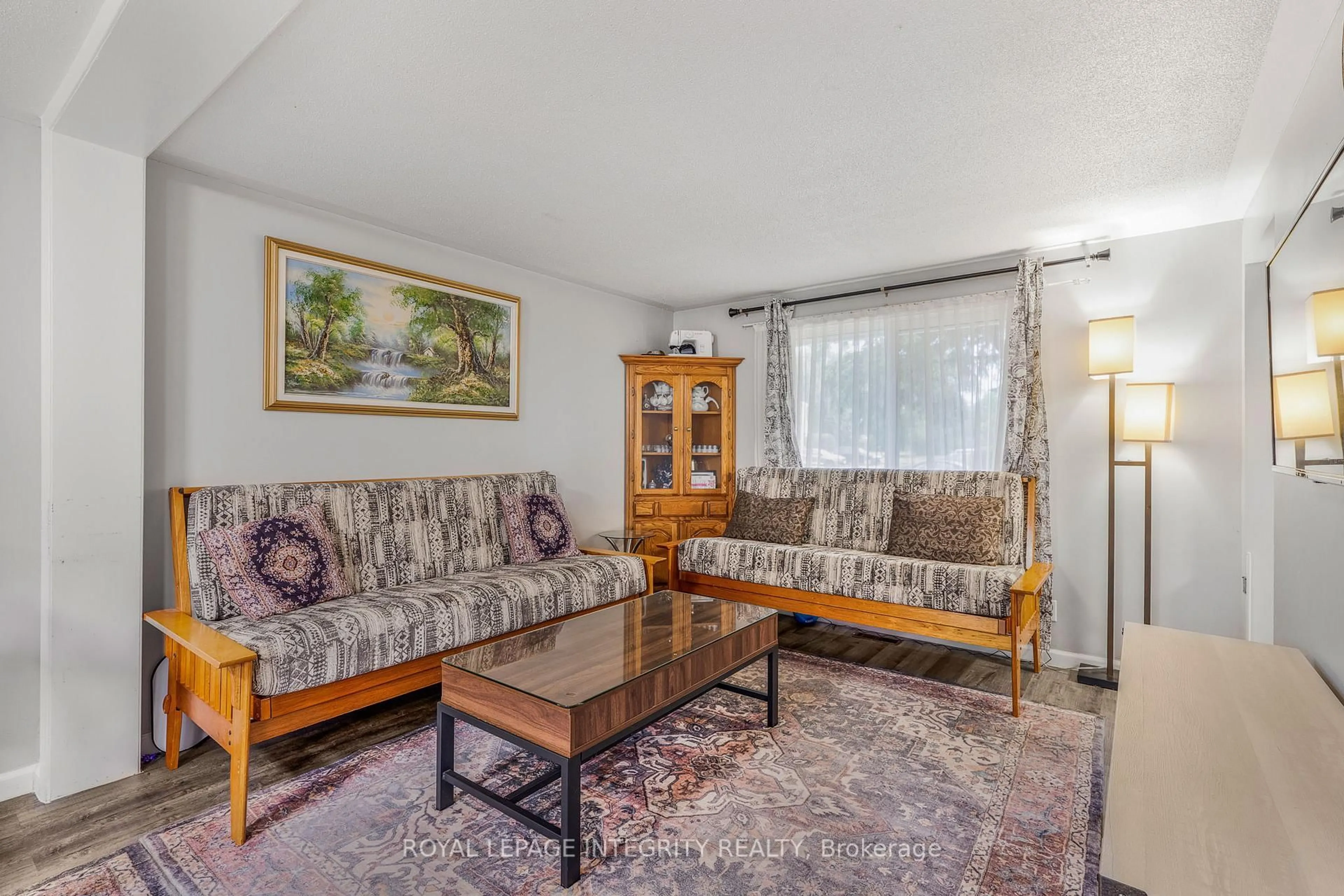 Living room with furniture, unknown for 1548 Beaverpond Dr #107, Ottawa Ontario K1B 3R9