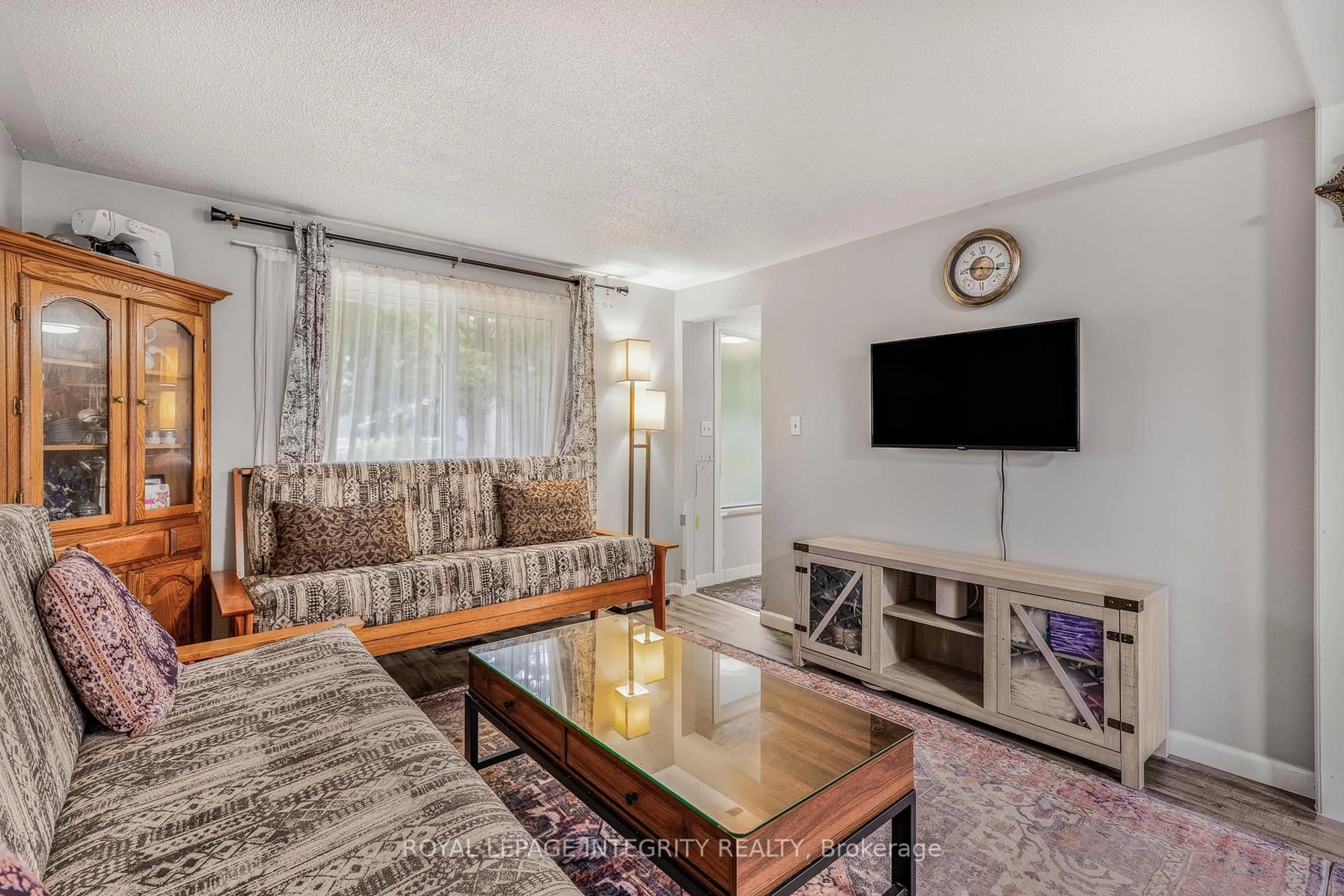 Living room with furniture, unknown for 1548 Beaverpond Dr #107, Ottawa Ontario K1B 3R9