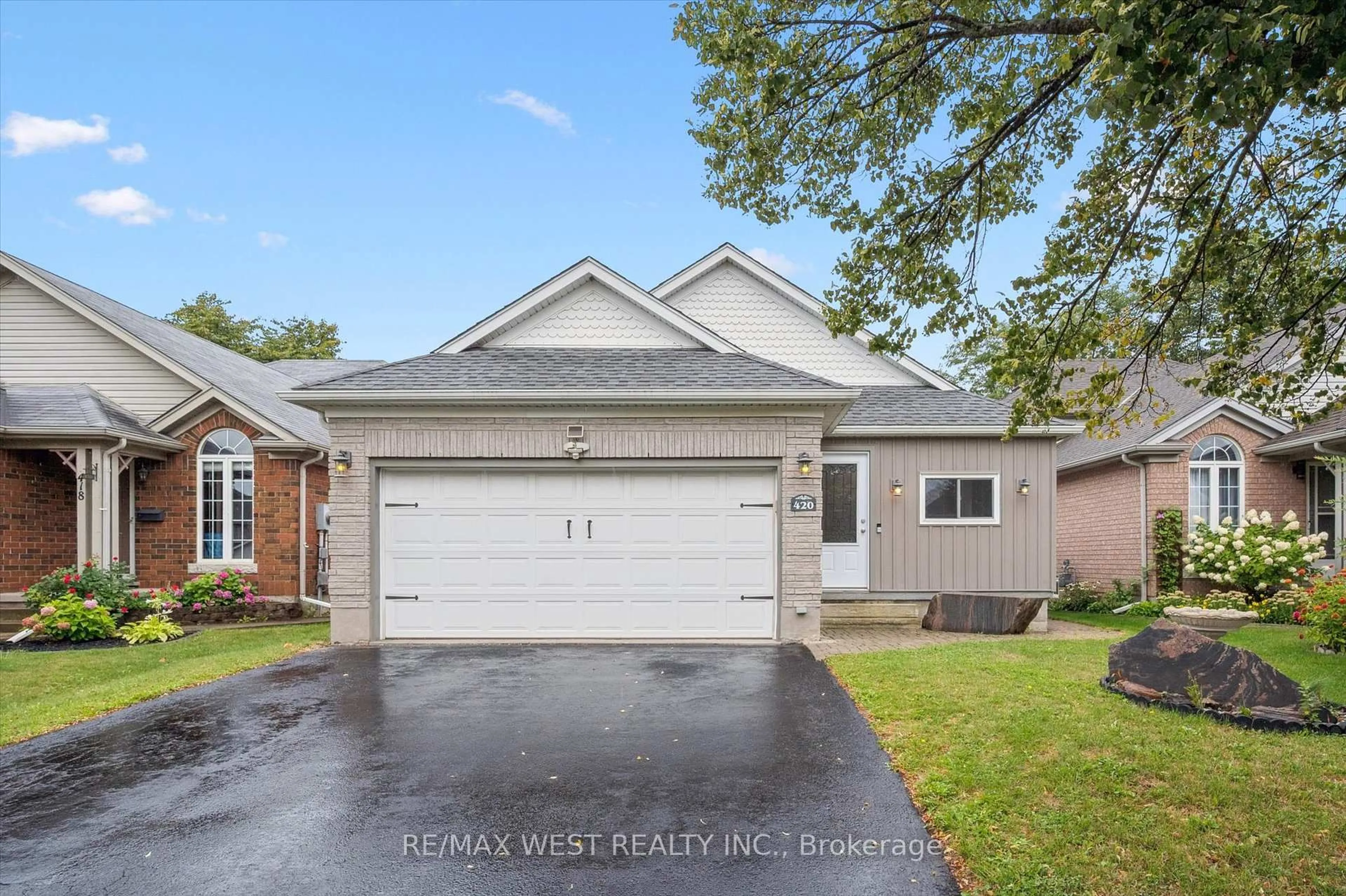 Home with vinyl exterior material, street for 420 Starwood Dr, Guelph Ontario N1E 7A4