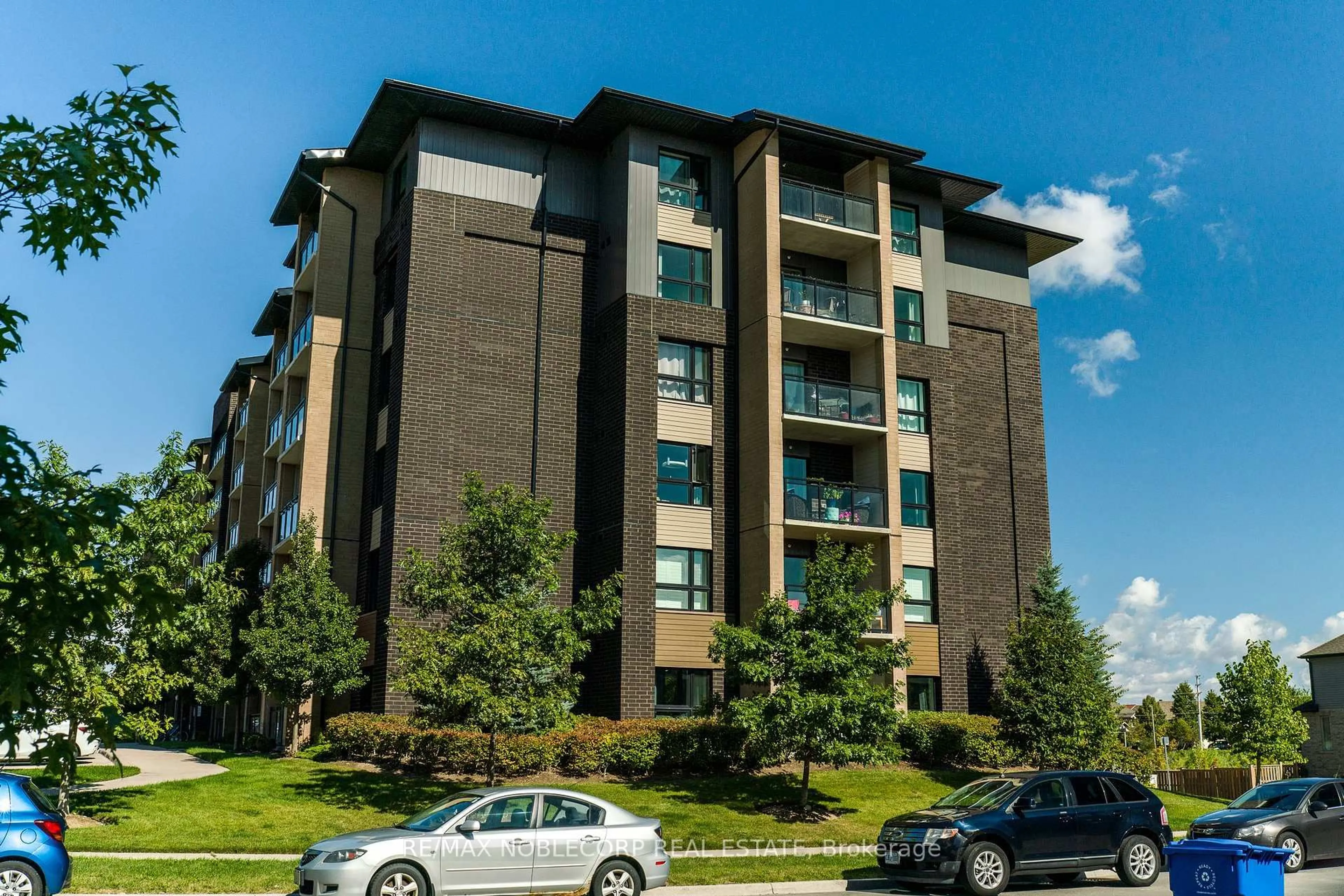 A pic from outside/outdoor area/front of a property/back of a property/a pic from drone, building for 7 Kay Cres #504, Guelph Ontario N1L 0P9
