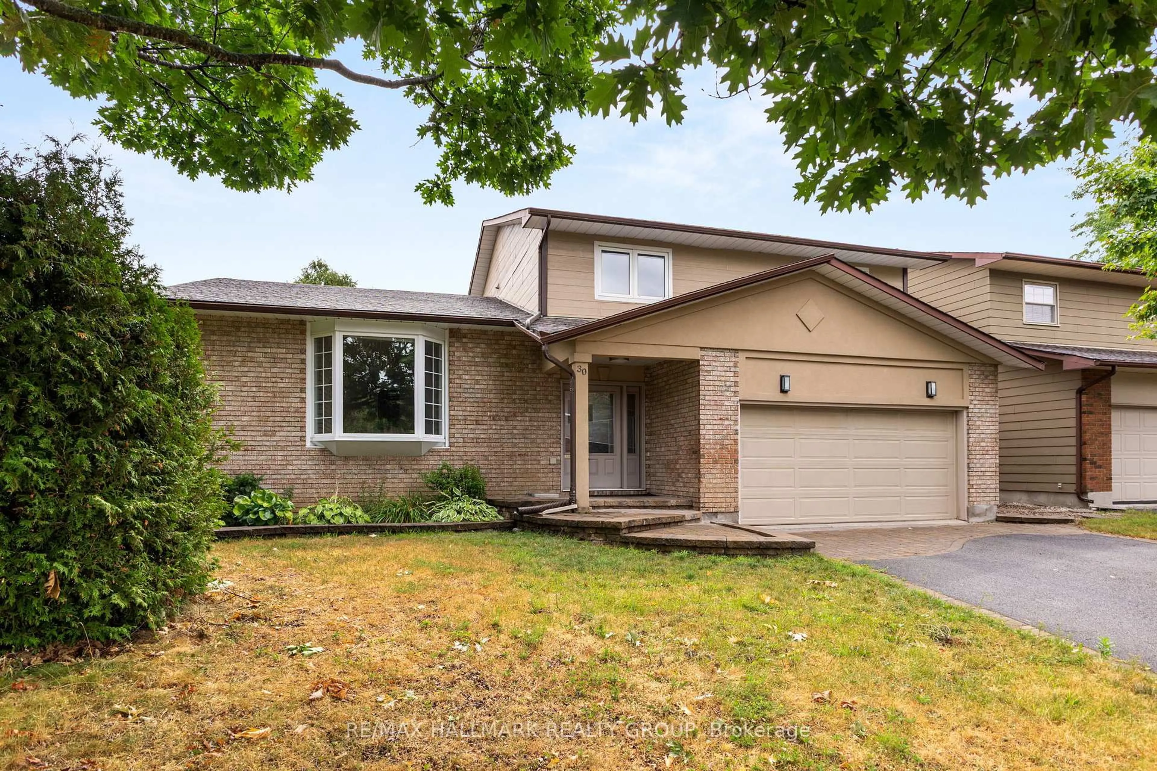 Home with brick exterior material, street for 30 Lillico Dr, Ottawa Ontario K1V 9L6