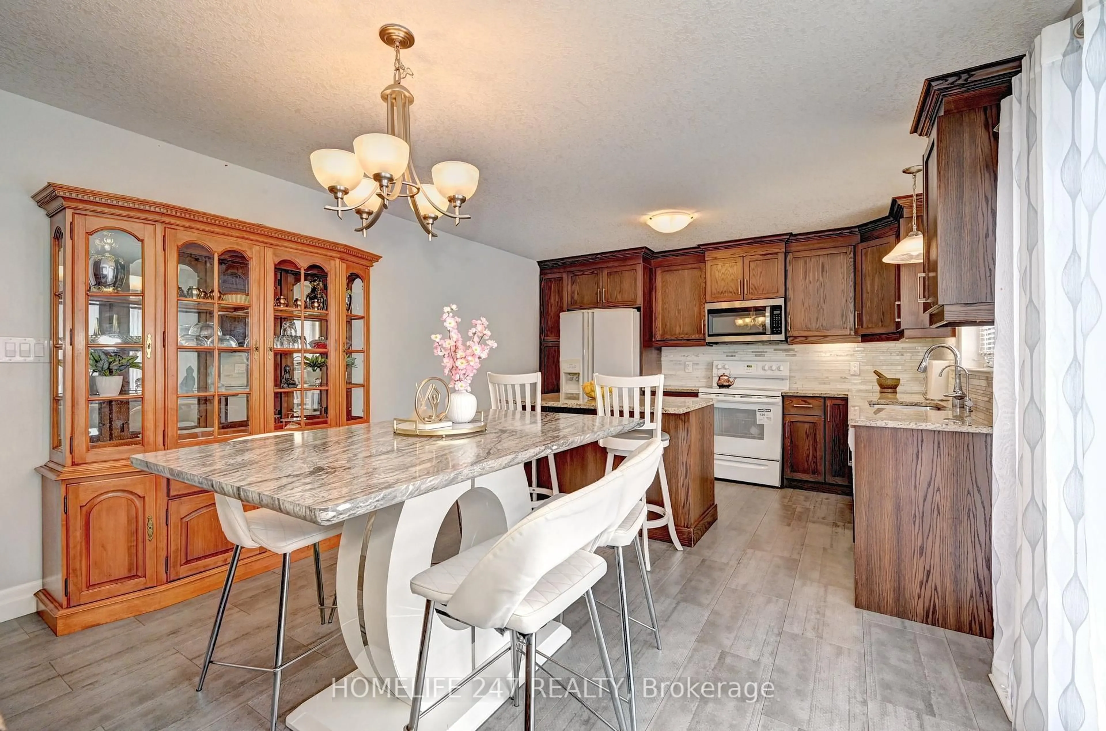 Open concept kitchen, ceramic/tile floor for 815 Binning St, North Perth Ontario N4W 1H3