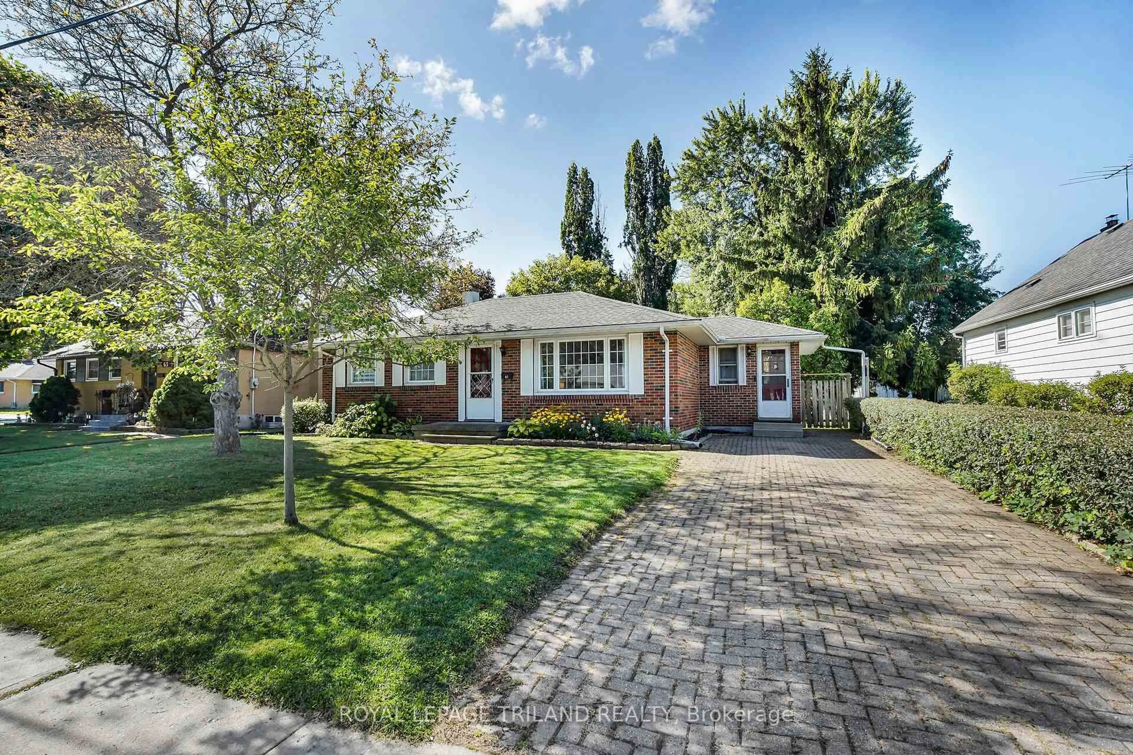 Home with brick exterior material, street for 61 Churchill Cres, St. Thomas Ontario N5R 1P4