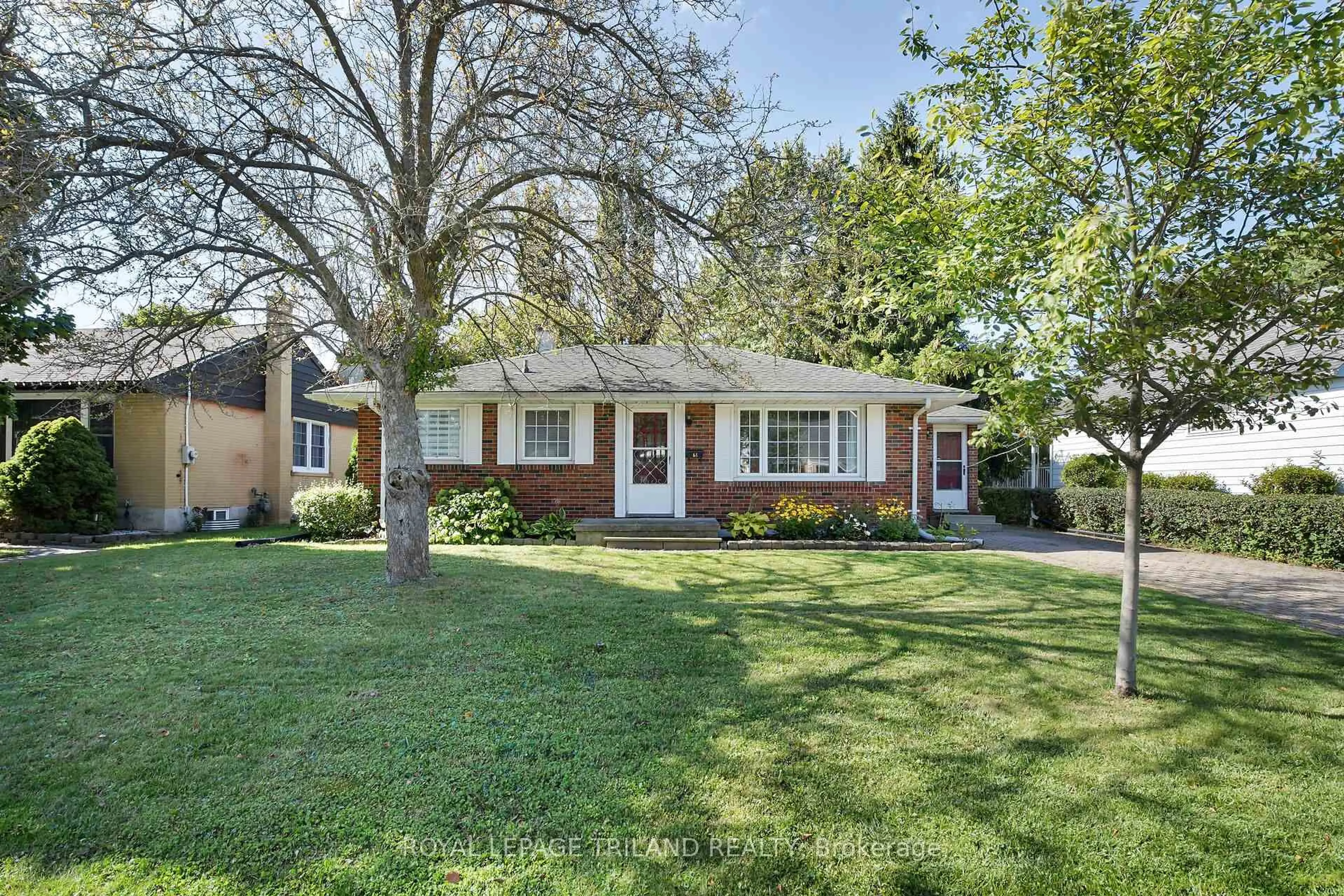 Home with brick exterior material, street for 61 Churchill Cres, St. Thomas Ontario N5R 1P4