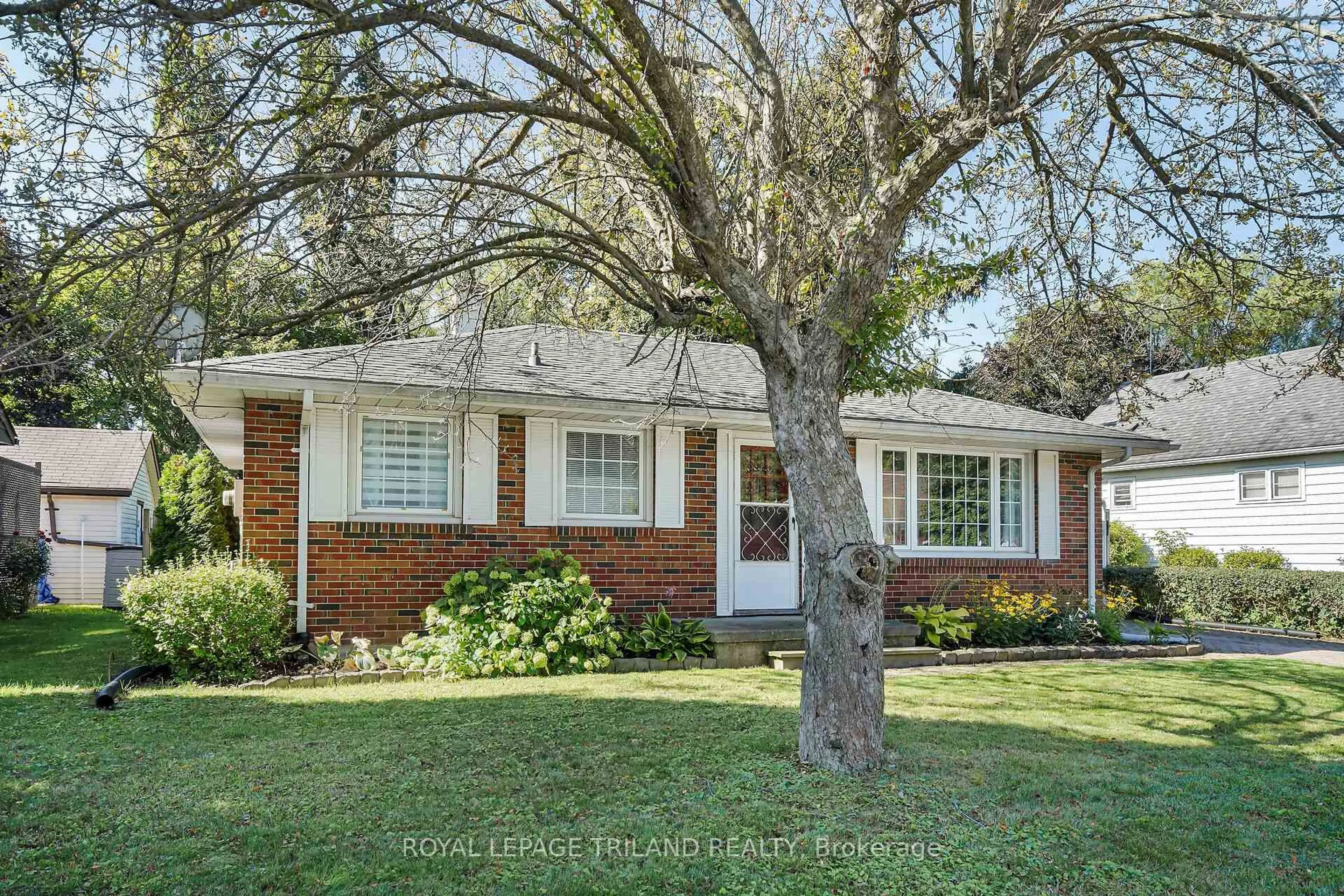 Home with brick exterior material, street for 61 Churchill Cres, St. Thomas Ontario N5R 1P4