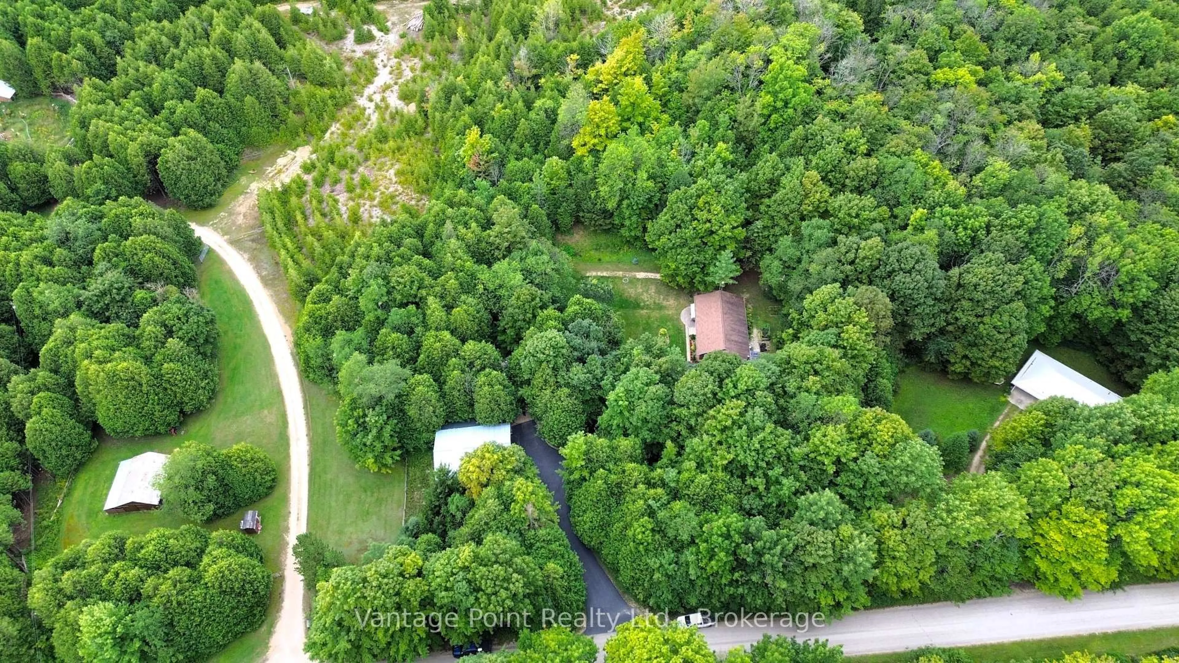 A pic from outside/outdoor area/front of a property/back of a property/a pic from drone, forest/trees view for 574256 40 Sdrd, West Grey Ontario N0C 1H0