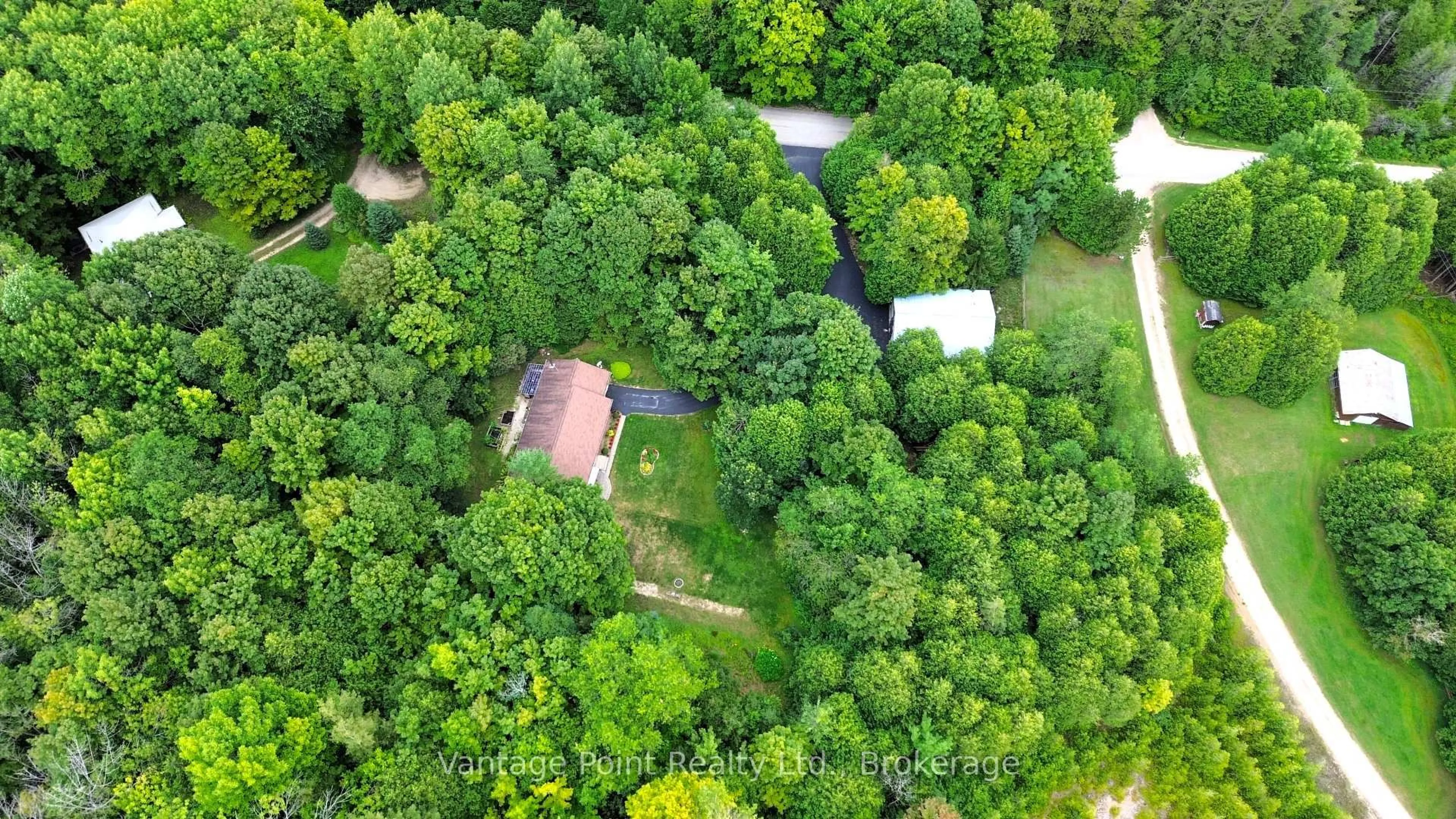 A pic from outside/outdoor area/front of a property/back of a property/a pic from drone, forest/trees view for 574256 40 Sdrd, West Grey Ontario N0C 1H0