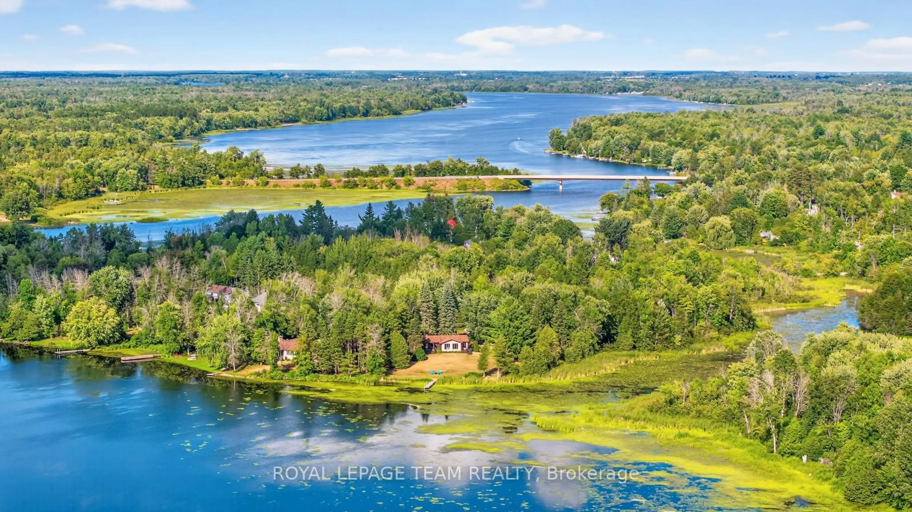 A pic from outside/outdoor area/front of a property/back of a property/a pic from drone, water/lake/river/ocean view for 4 Rideau Lane, North Grenville Ontario K0G 1J0