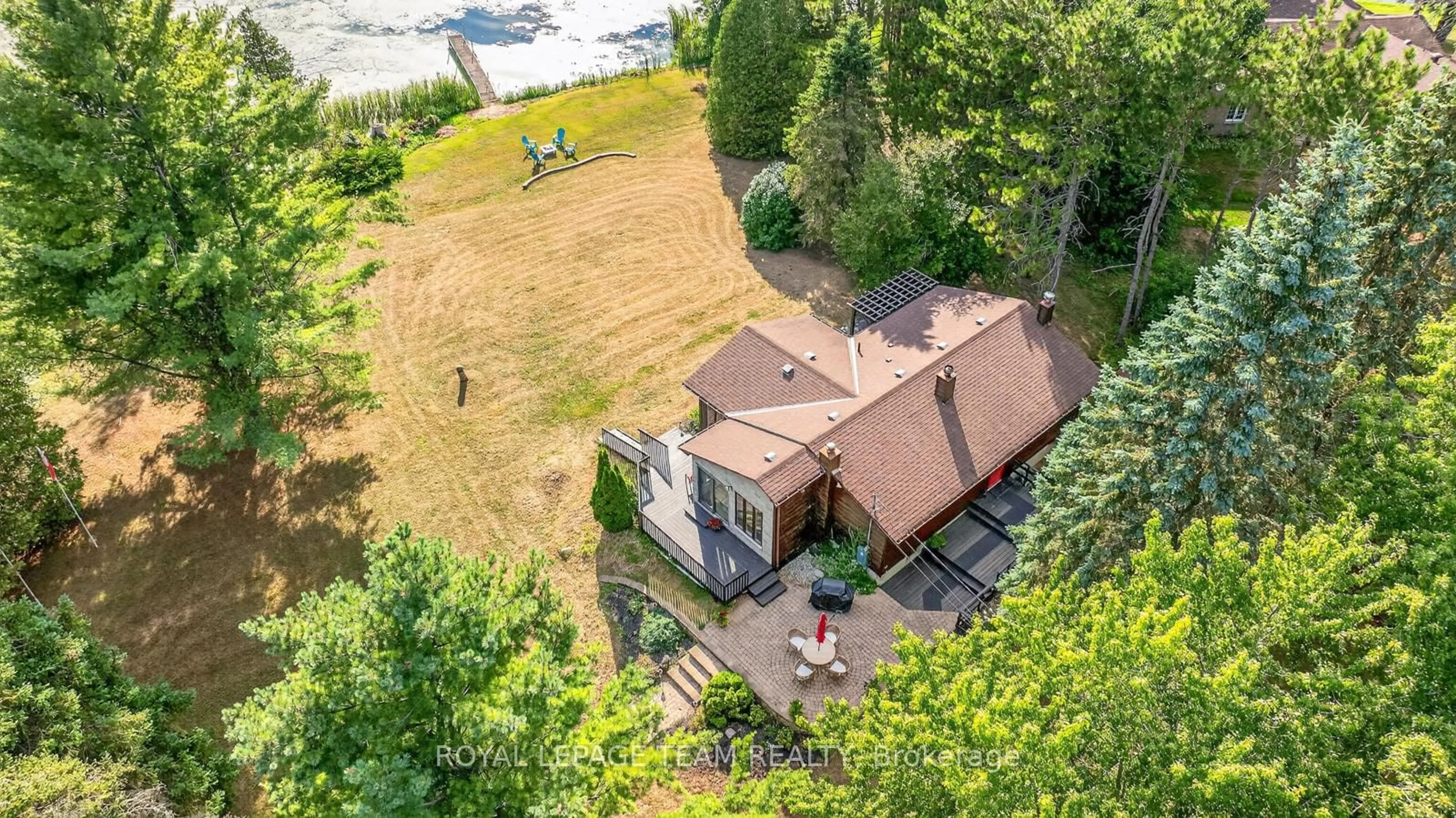 A pic from outside/outdoor area/front of a property/back of a property/a pic from drone, water/lake/river/ocean view for 4 Rideau Lane, North Grenville Ontario K0G 1J0