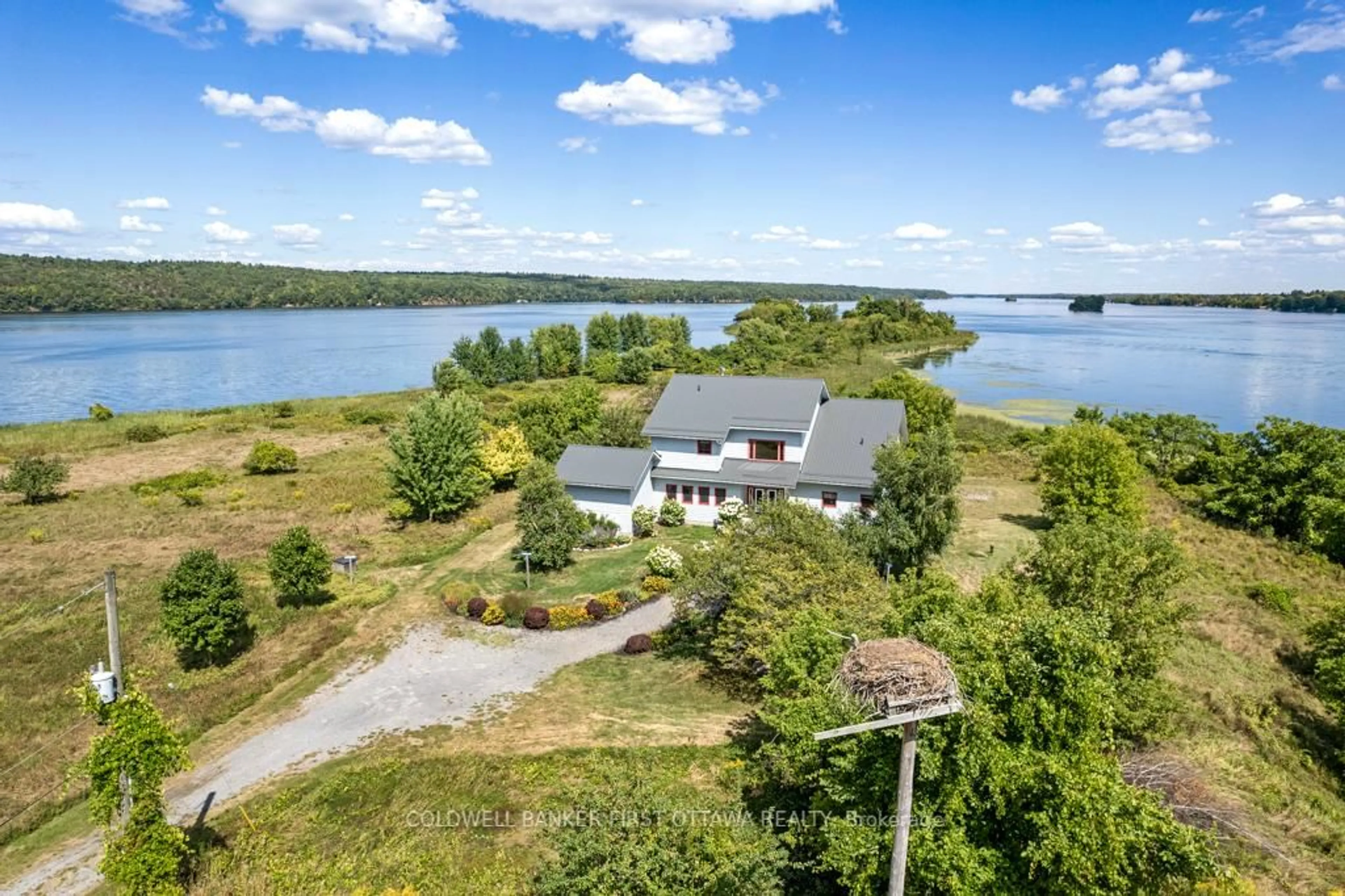 A pic from outside/outdoor area/front of a property/back of a property/a pic from drone, water/lake/river/ocean view for 9868 COUNTY ROAD 42 Rd, Rideau Lakes Ontario K0G 1X0