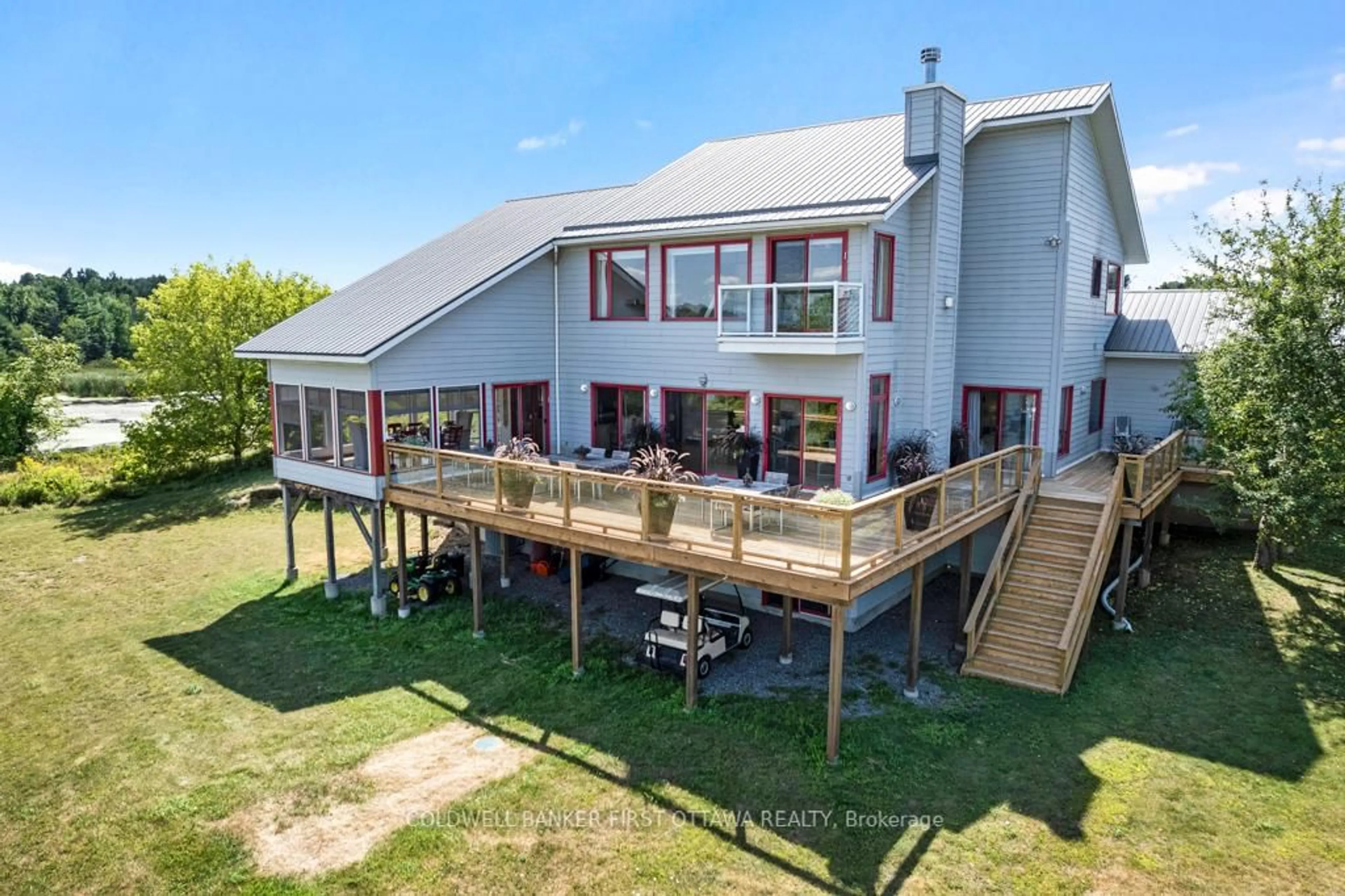 A pic from outside/outdoor area/front of a property/back of a property/a pic from drone, building for 9868 COUNTY ROAD 42 Rd, Rideau Lakes Ontario K0G 1X0