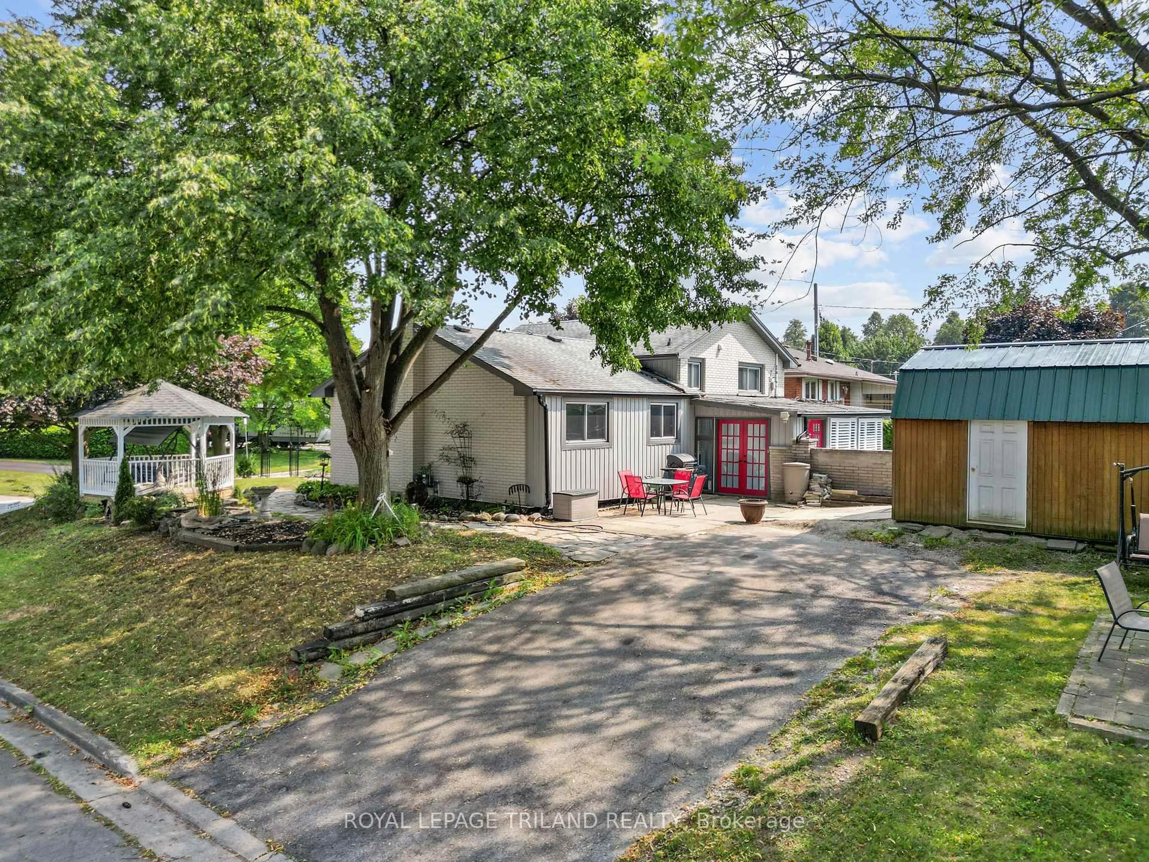 A pic from outside/outdoor area/front of a property/back of a property/a pic from drone, street for 65 Almond Rd, London South Ontario N5Z 4C7