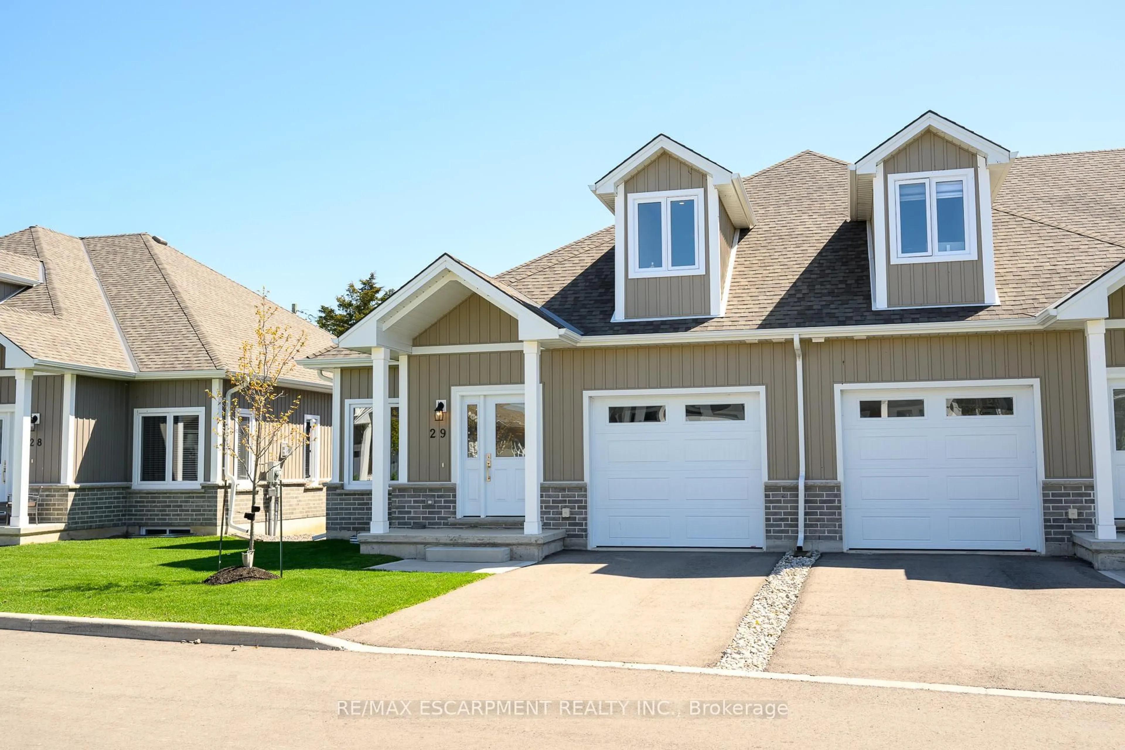 Home with vinyl exterior material, street for 744 Nelson St #29, Norfolk Ontario N0A 1N0