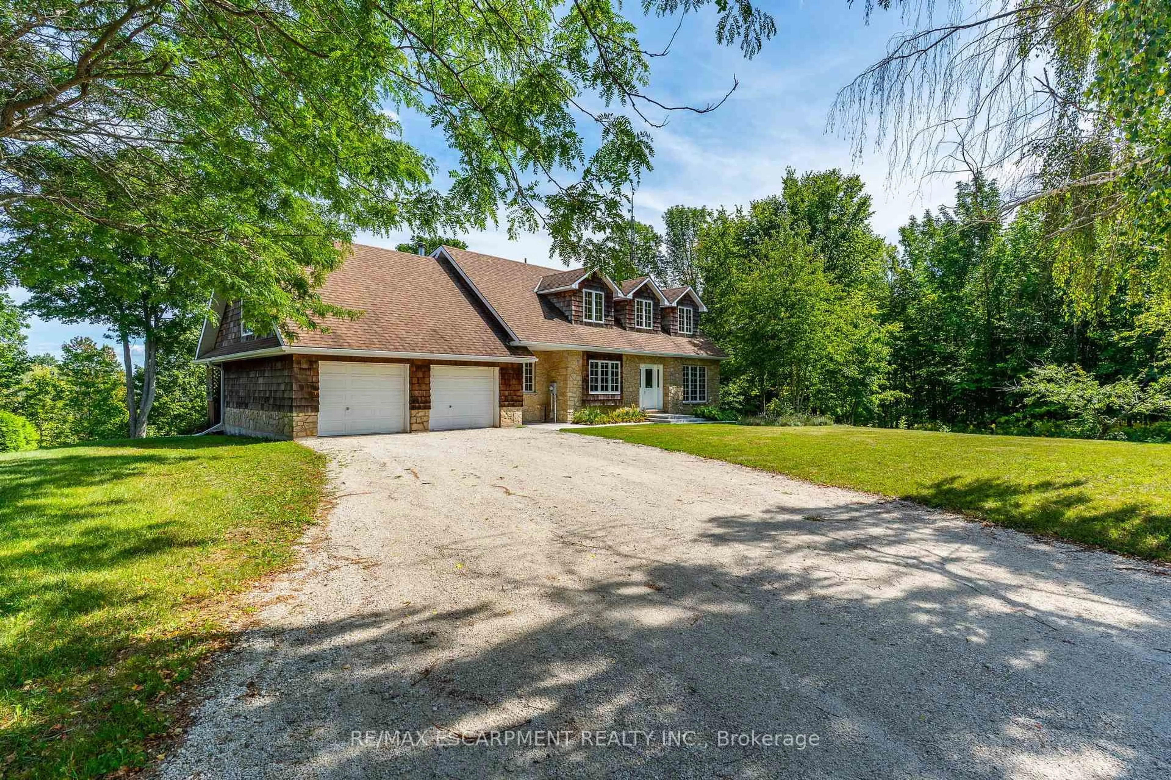 A pic from outside/outdoor area/front of a property/back of a property/a pic from drone, unknown for 50 Everett Rd, South Bruce Peninsula Ontario N0H 2T0
