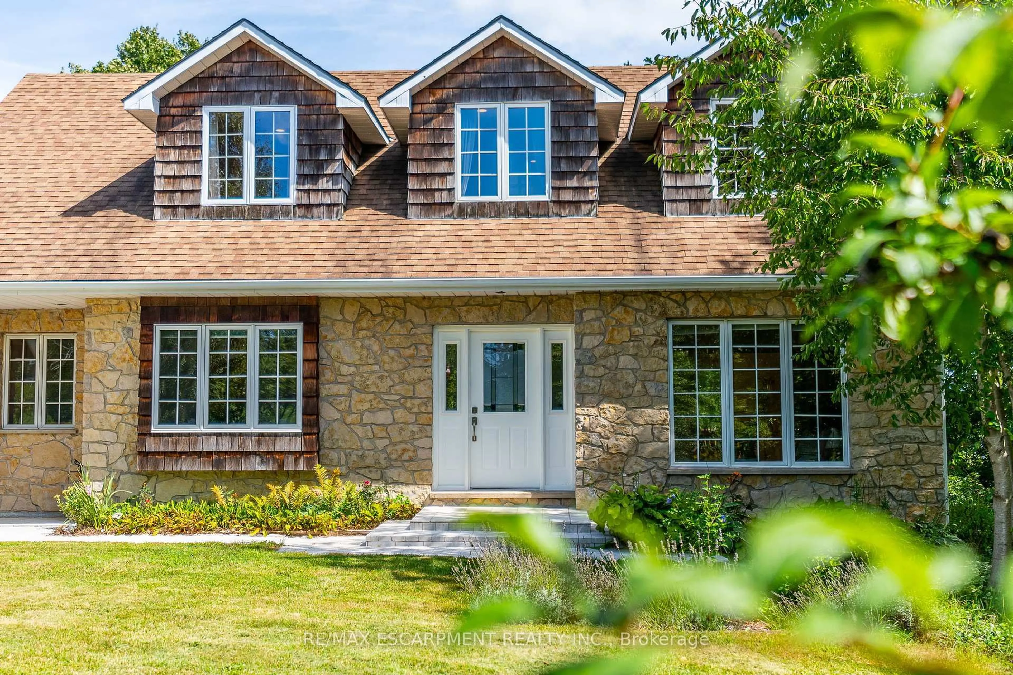 Home with brick exterior material, street for 50 Everett Rd, South Bruce Peninsula Ontario N0H 2T0