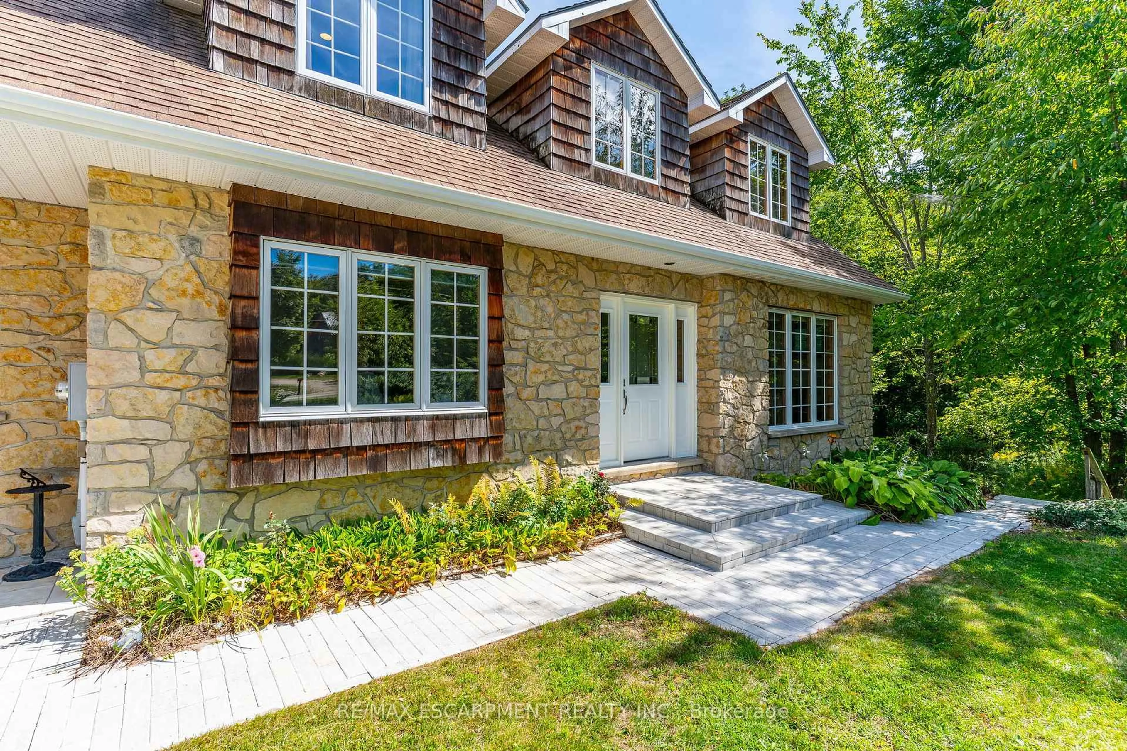 Home with brick exterior material, street for 50 Everett Rd, South Bruce Peninsula Ontario N0H 2T0