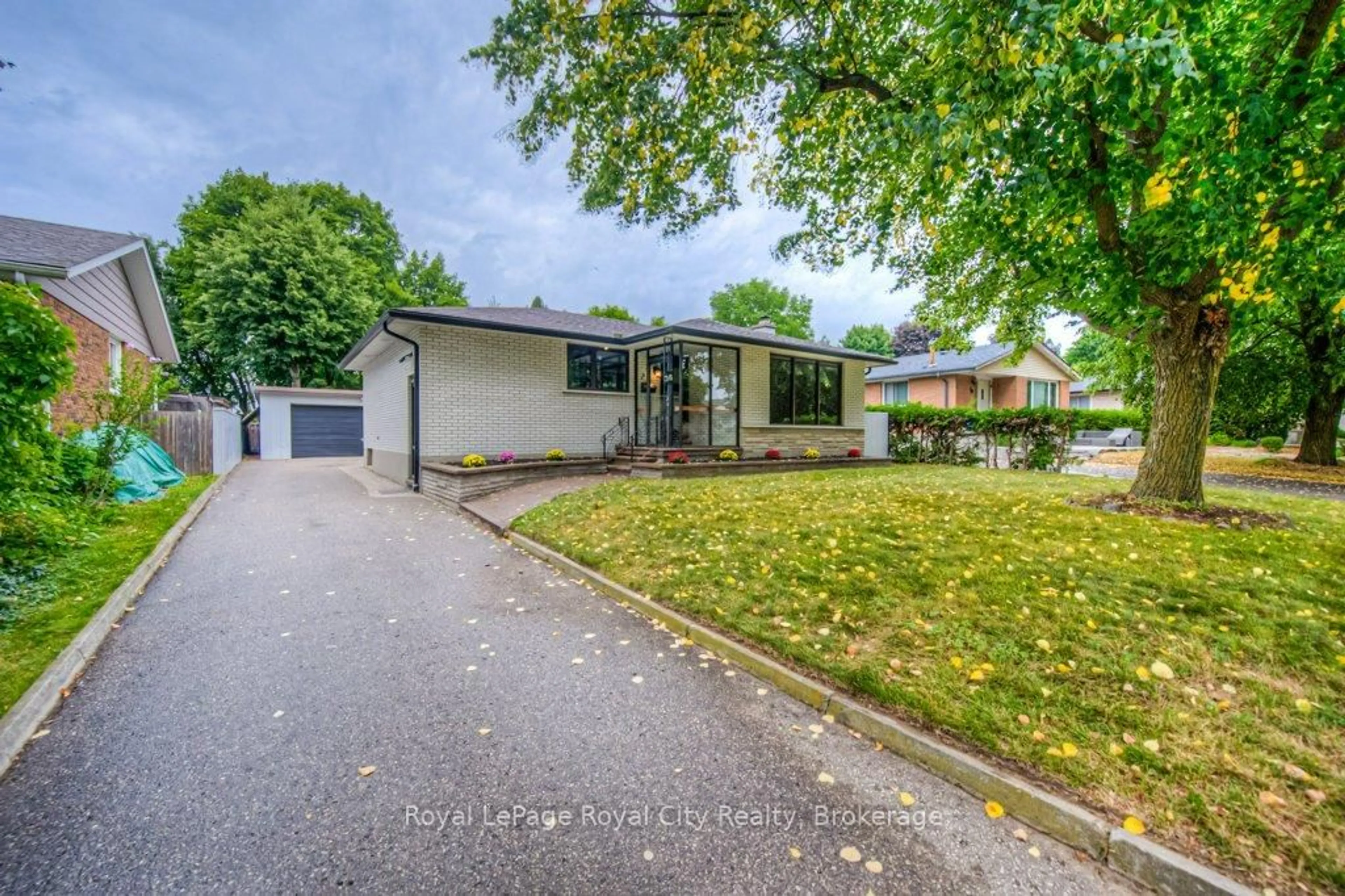 Home with vinyl exterior material, street for 36 Argyle Dr, Guelph Ontario N1G 2P2