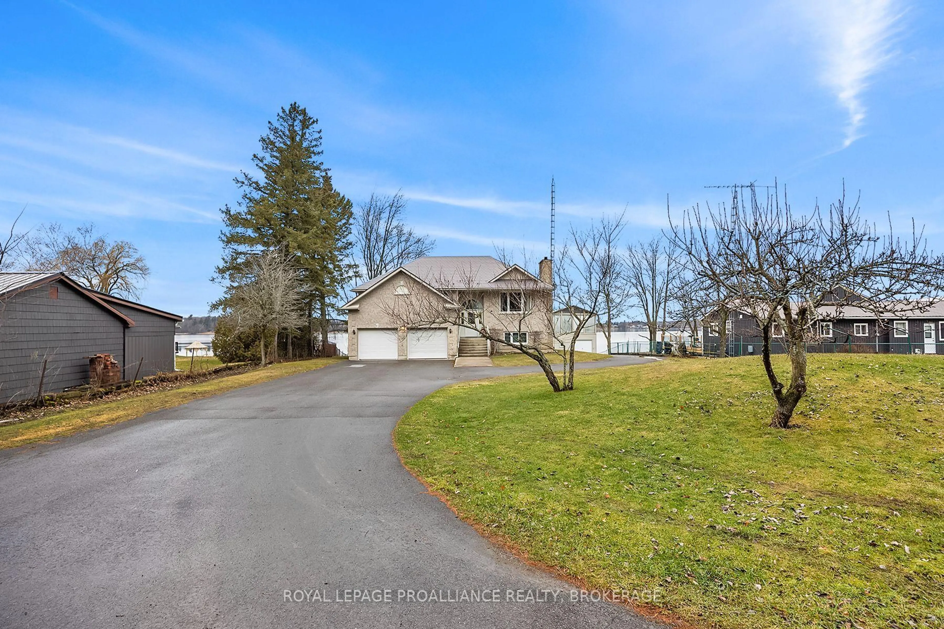 A pic from outside/outdoor area/front of a property/back of a property/a pic from drone, water/lake/river/ocean view for 1 Leavis Shores, Gananoque Ontario K7G 2V6