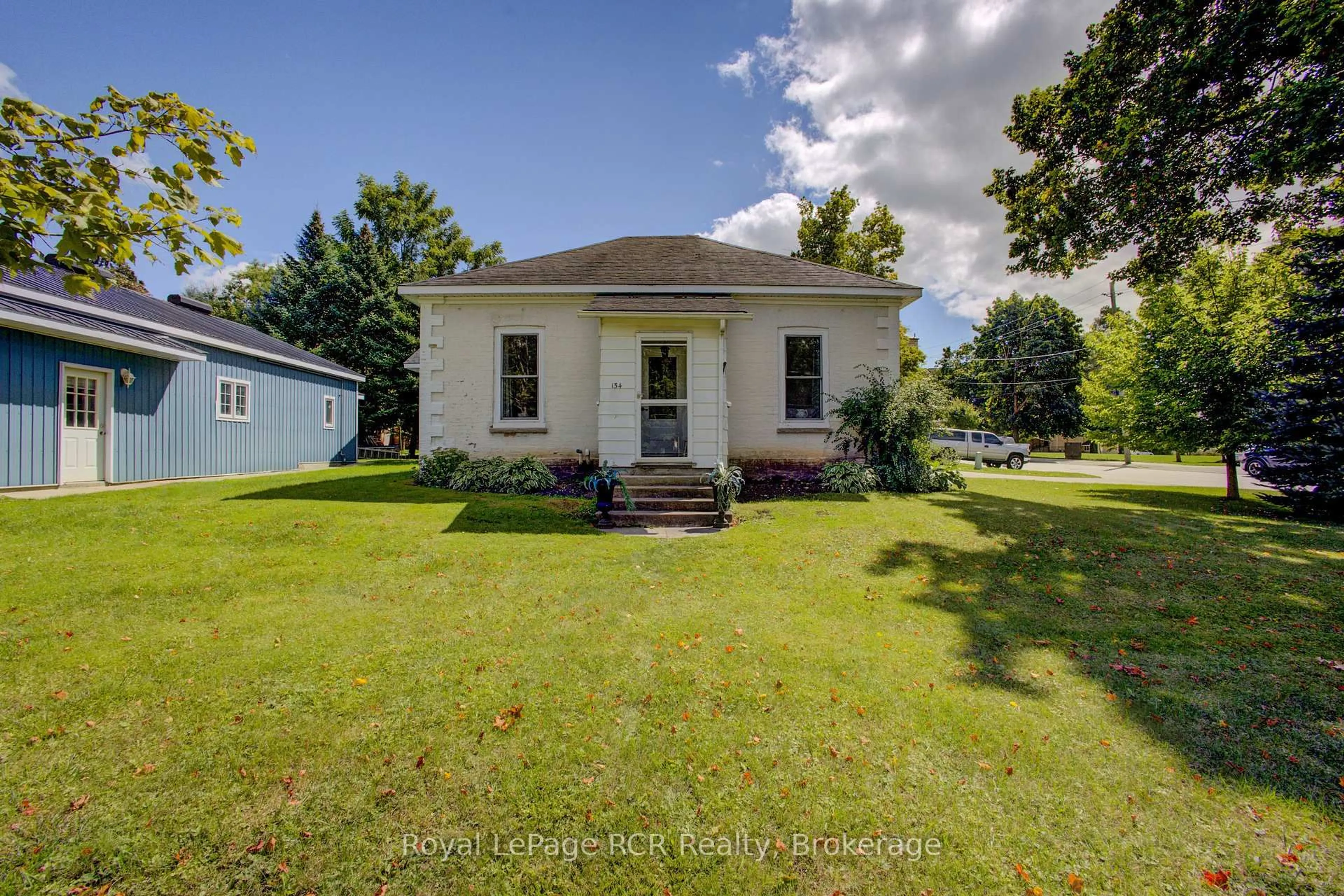 A pic from outside/outdoor area/front of a property/back of a property/a pic from drone, unknown for 134 Frederick St, Wellington North Ontario N0G 1A0