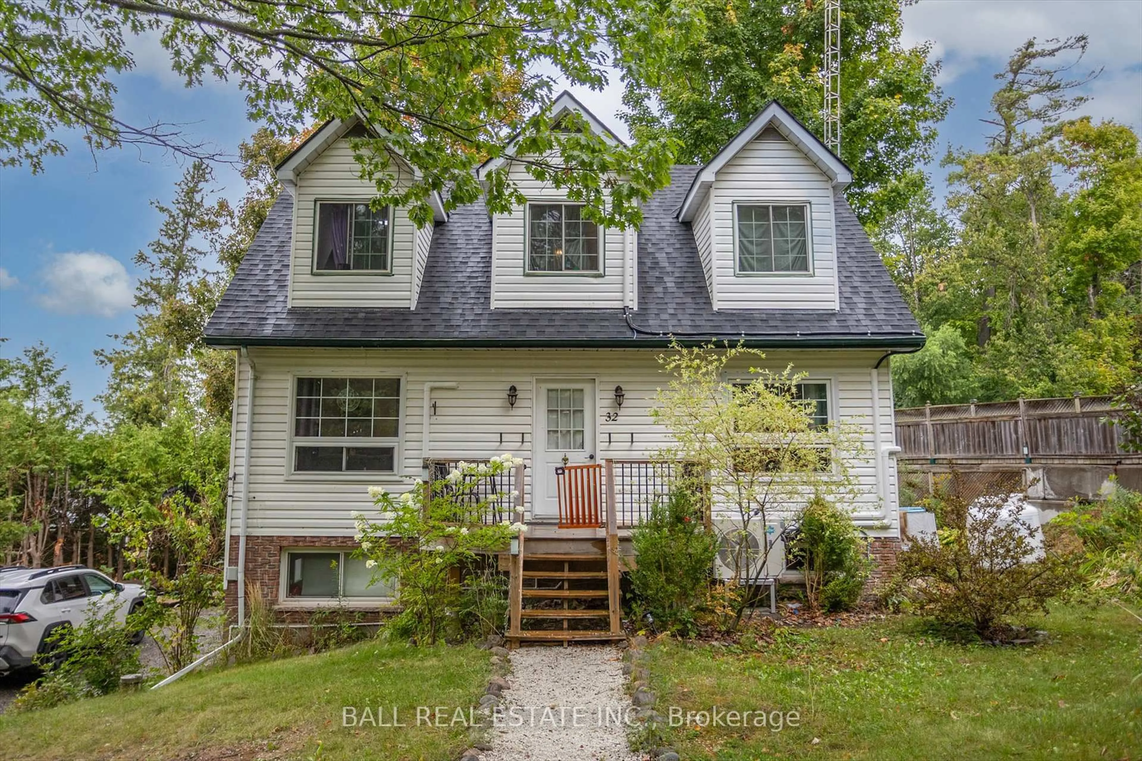 Home with vinyl exterior material, street for 32 Cherryhill St, Kawartha Lakes Ontario K0M 1L0