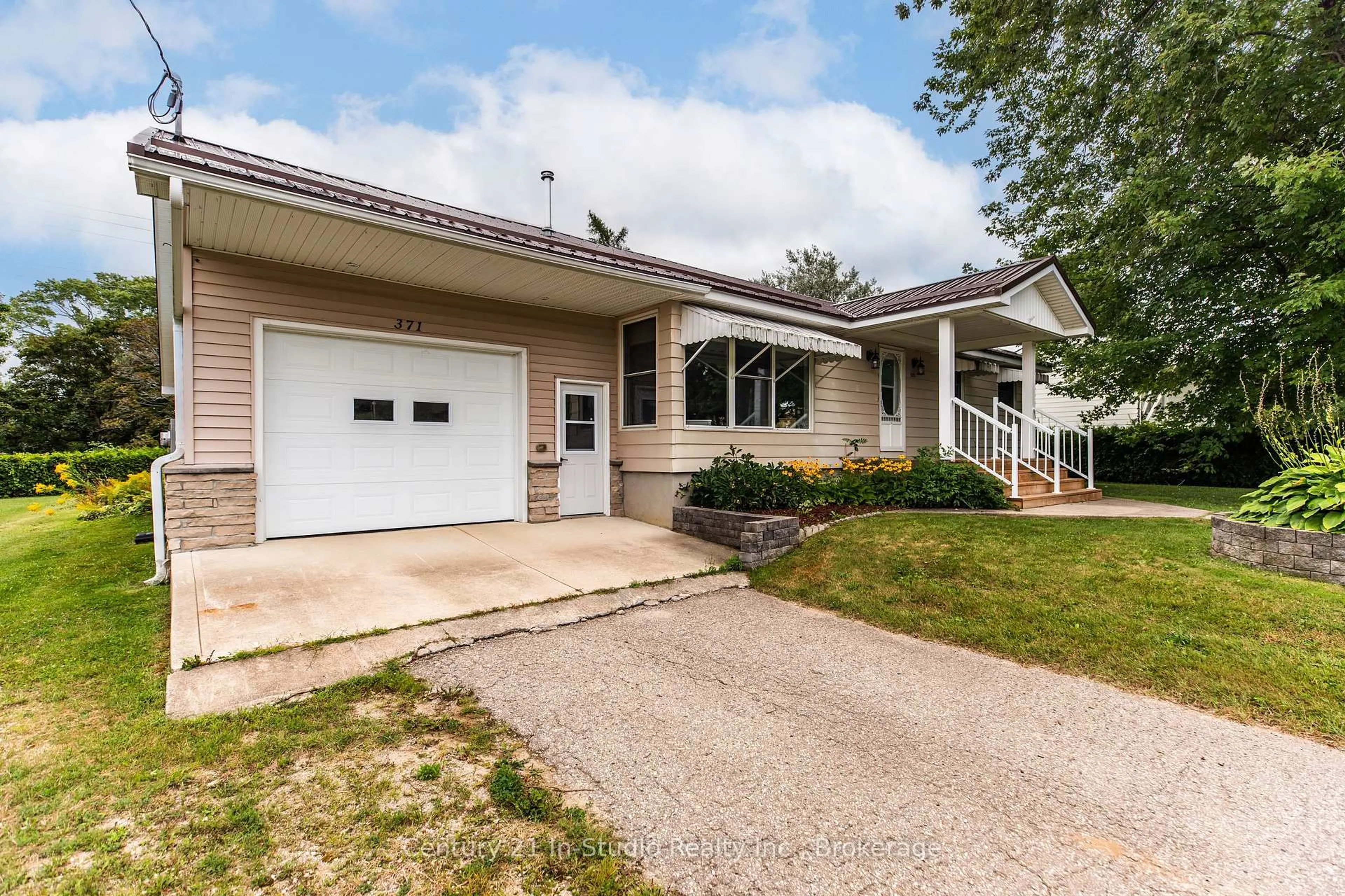 Home with vinyl exterior material, street for 371 Hunter St, South Bruce Peninsula Ontario N0H 2T0