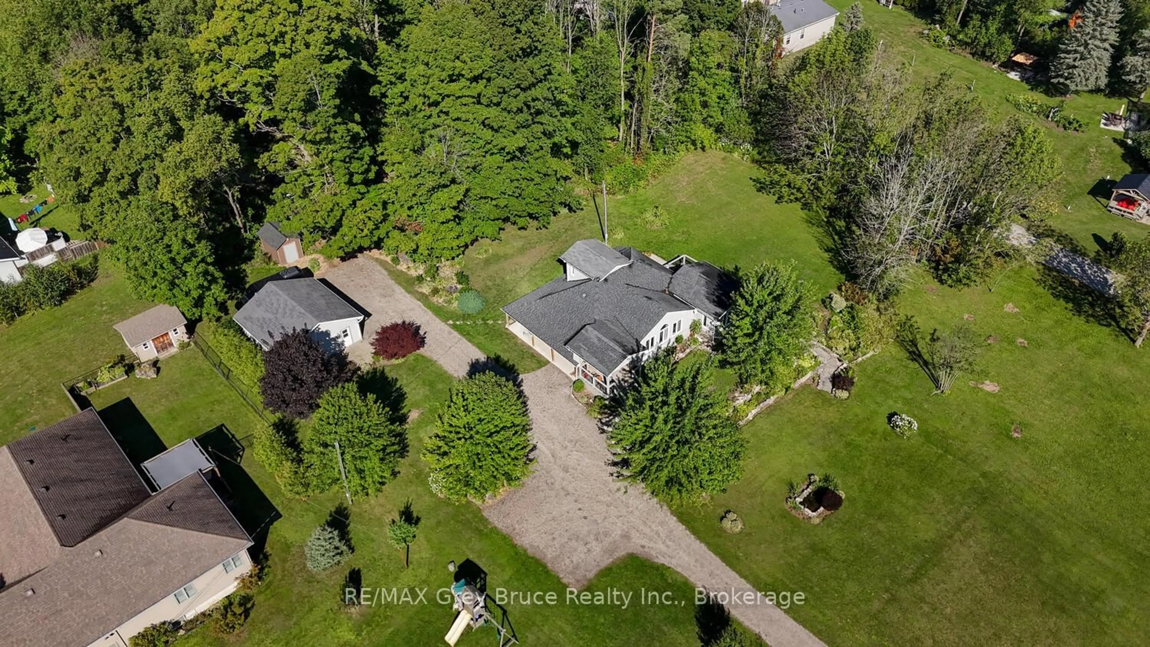 A pic from outside/outdoor area/front of a property/back of a property/a pic from drone, street for 106 Drive-In Cres, Georgian Bluffs Ontario N4K 5N7