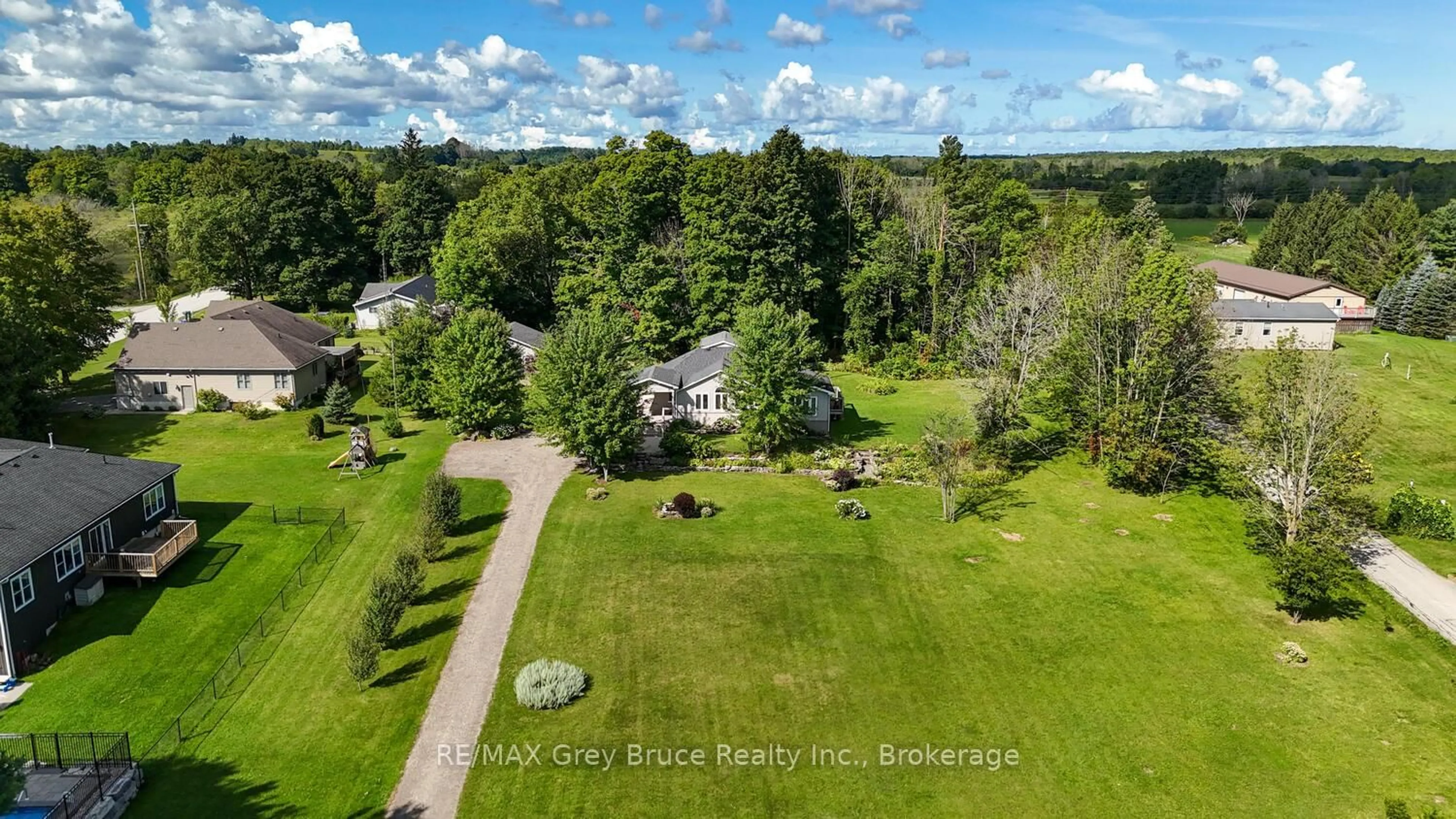 A pic from outside/outdoor area/front of a property/back of a property/a pic from drone, water/lake/river/ocean view for 106 Drive-In Cres, Georgian Bluffs Ontario N4K 5N7