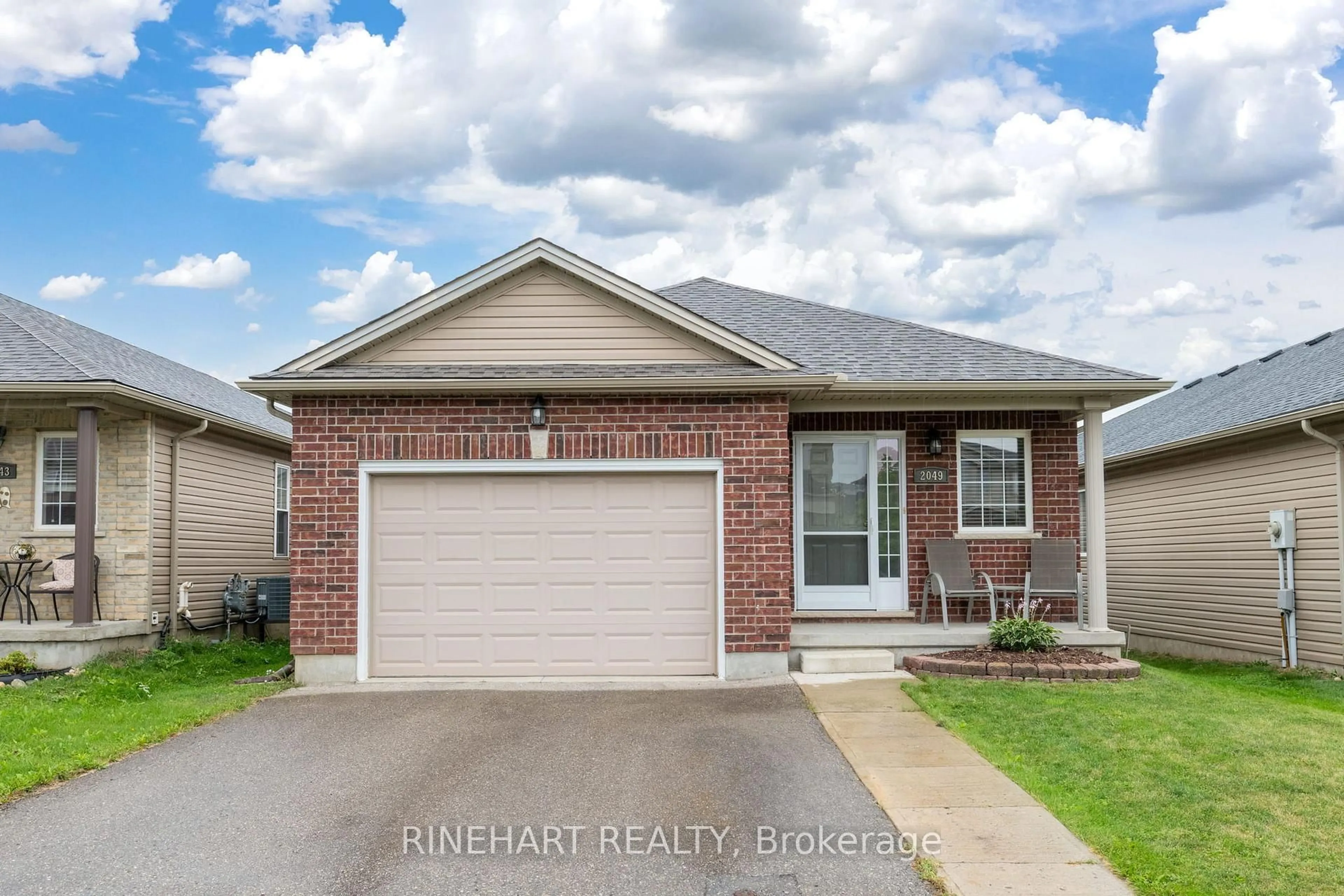 Home with brick exterior material, street for 2049 Cherrywood Tr, London North Ontario N6H 0C8