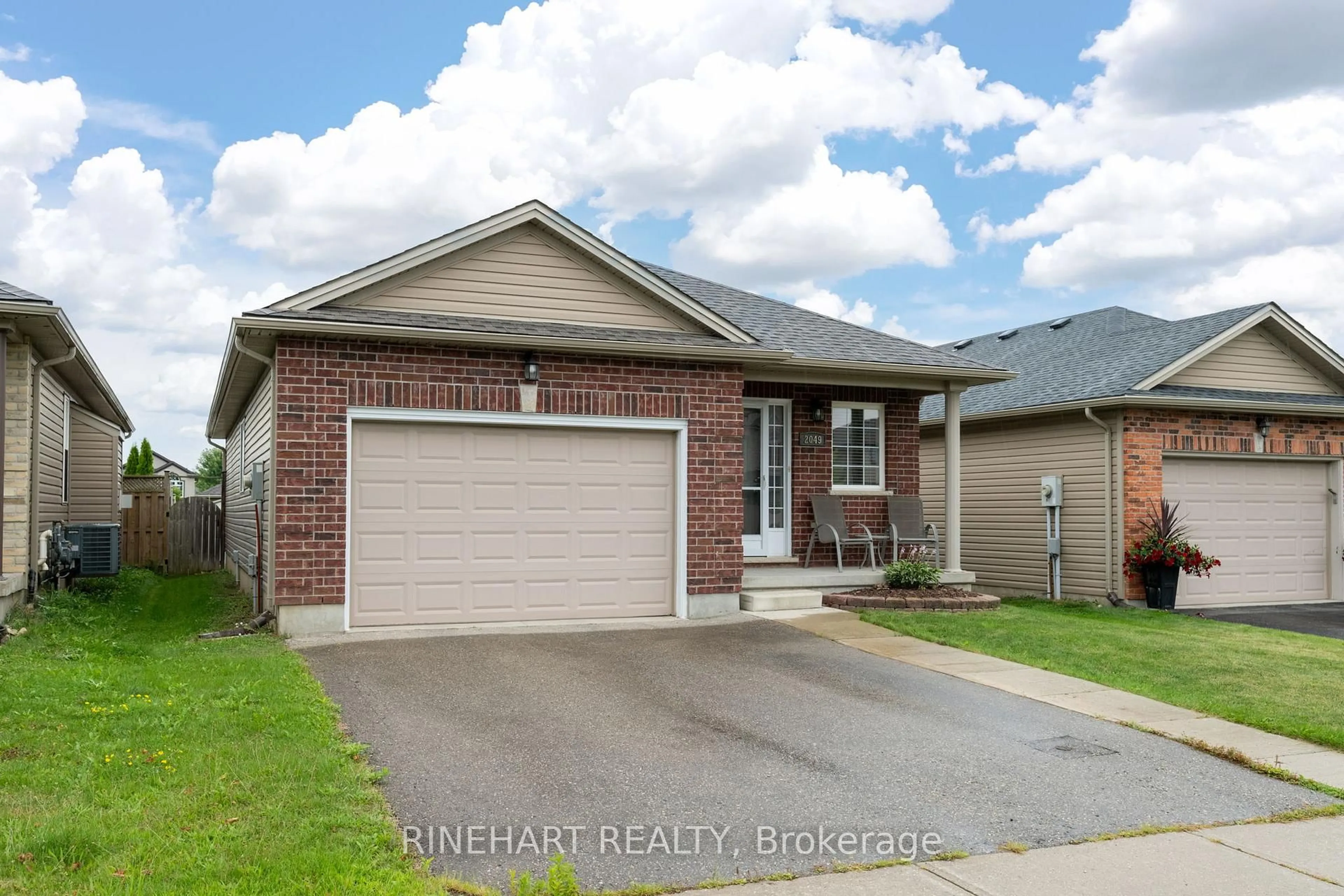 Home with brick exterior material, street for 2049 Cherrywood Tr, London North Ontario N6H 0C8