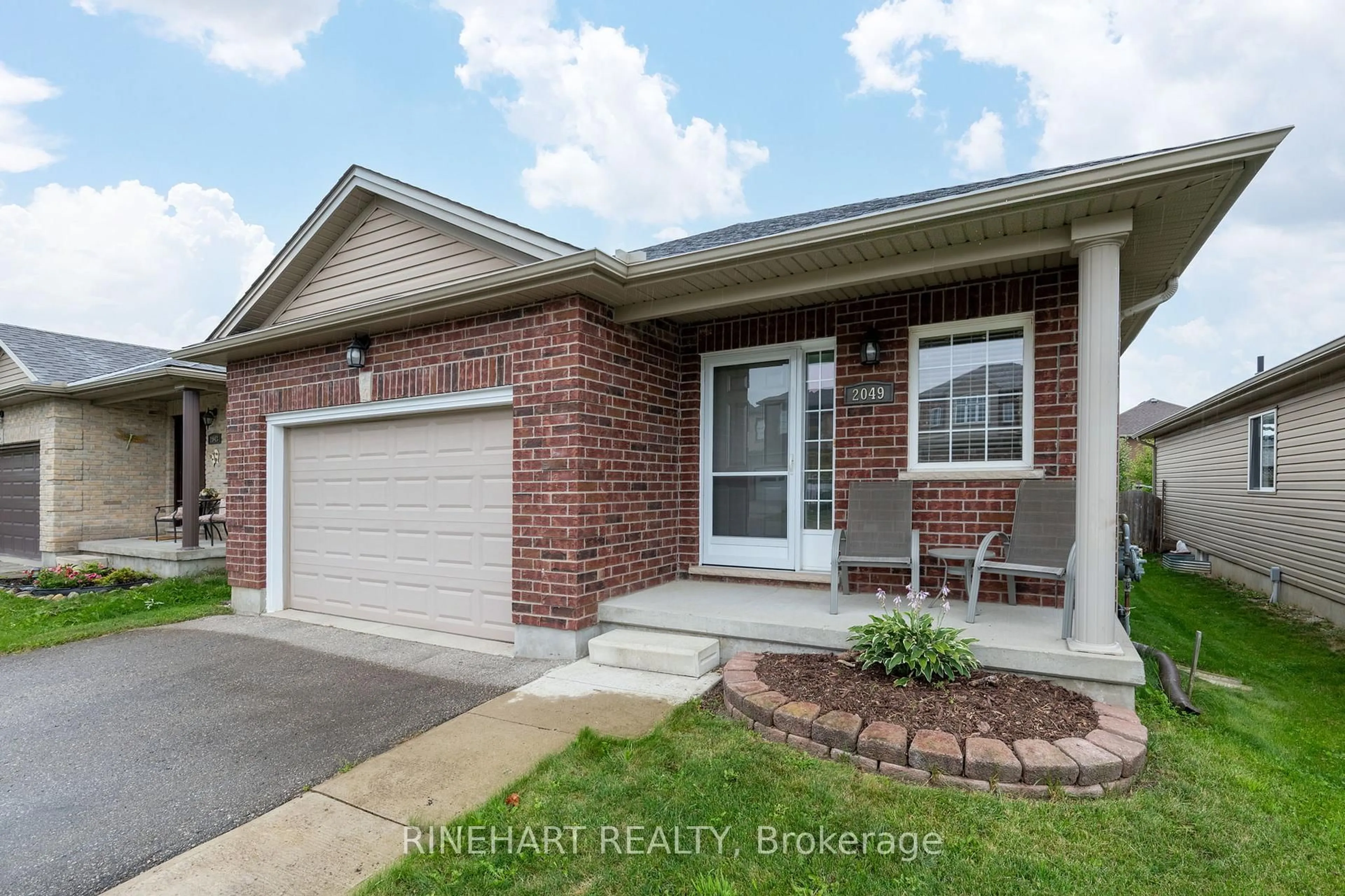 Home with brick exterior material, street for 2049 Cherrywood Tr, London North Ontario N6H 0C8