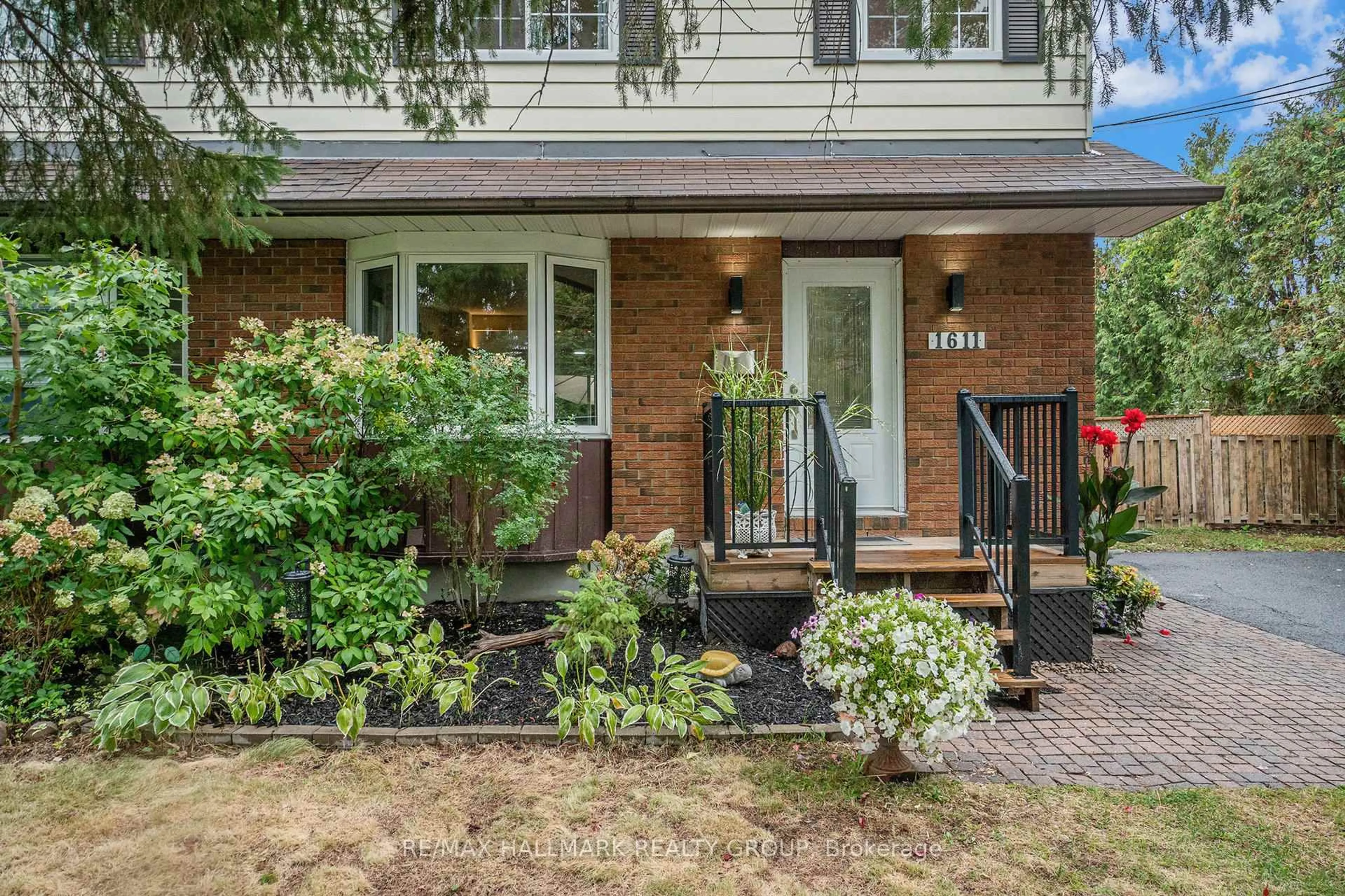 Home with brick exterior material, street for 1611 Belcourt Blvd, Orleans Ontario K1C 1M3