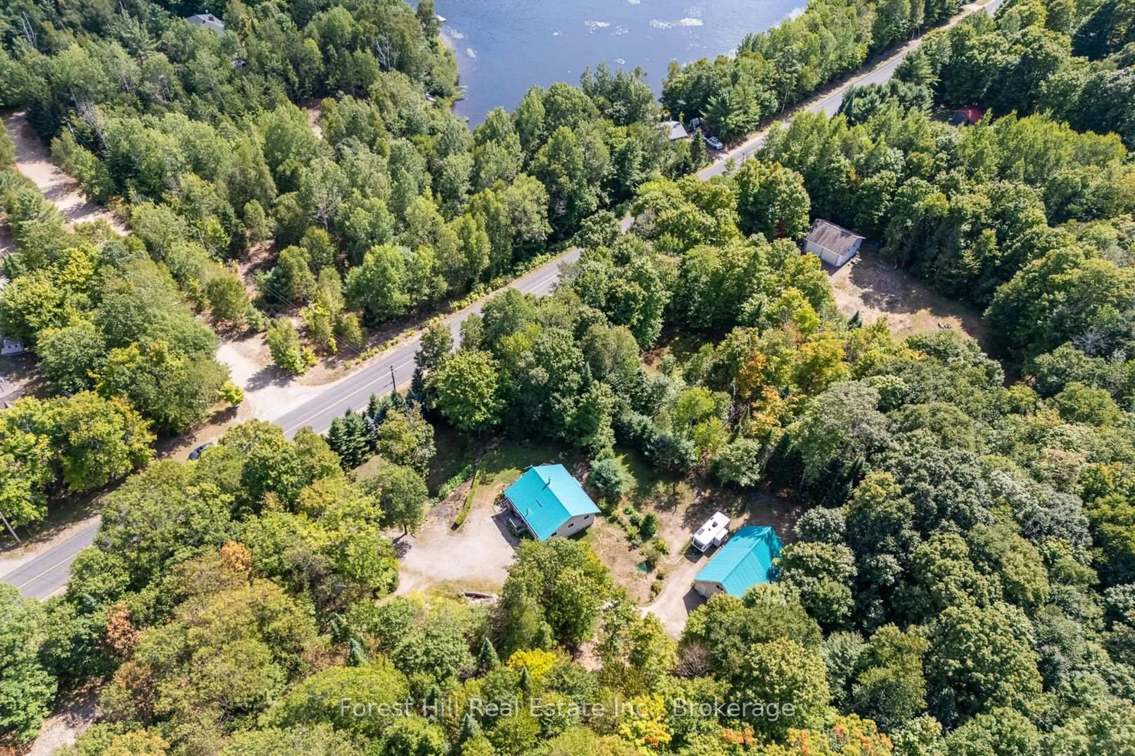 A pic from outside/outdoor area/front of a property/back of a property/a pic from drone, water/lake/river/ocean view for 2851 Kawagama Lake Rd, Algonquin Highlands Ontario P0A 1E0