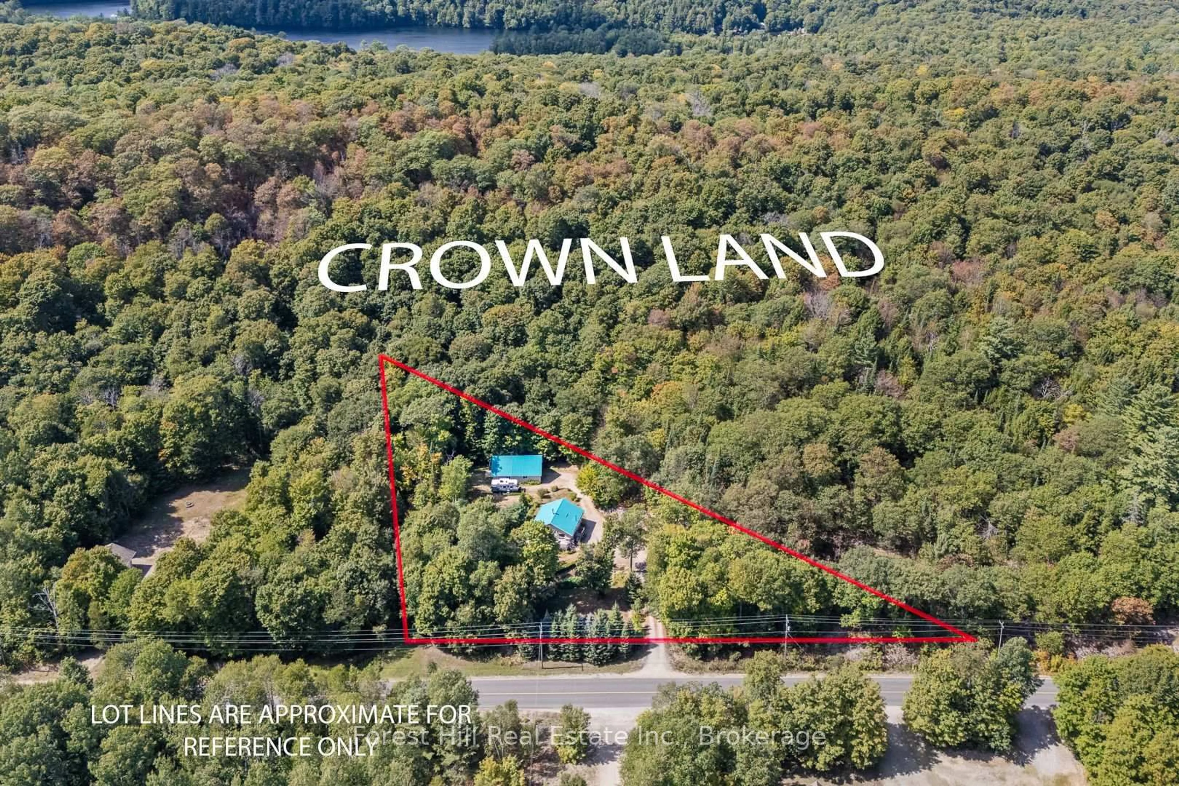 A pic from outside/outdoor area/front of a property/back of a property/a pic from drone, water/lake/river/ocean view for 2851 Kawagama Lake Rd, Algonquin Highlands Ontario P0A 1E0