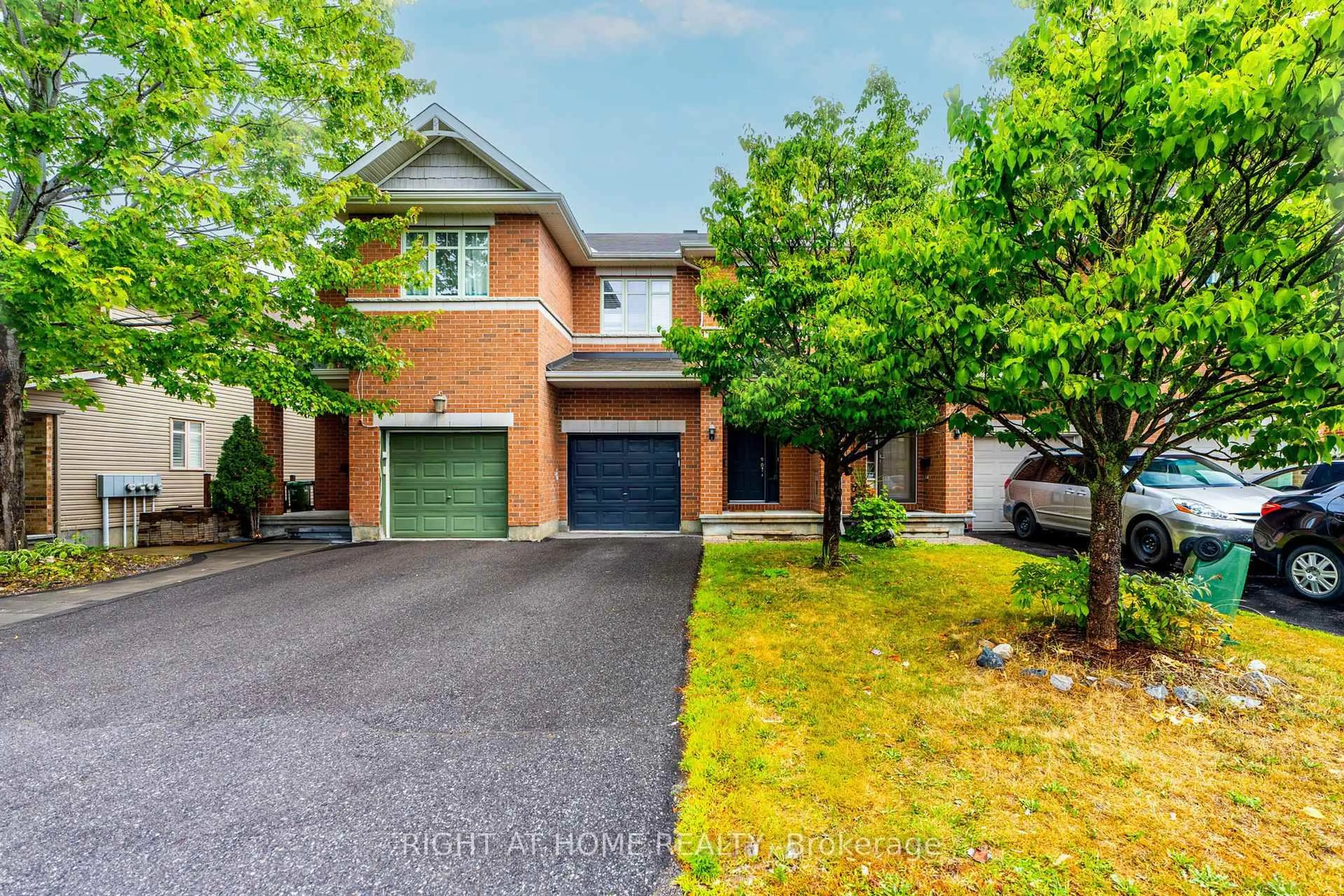 Home with brick exterior material, street for 241 BADGELEY Ave, Ottawa Ontario K2T 0A7