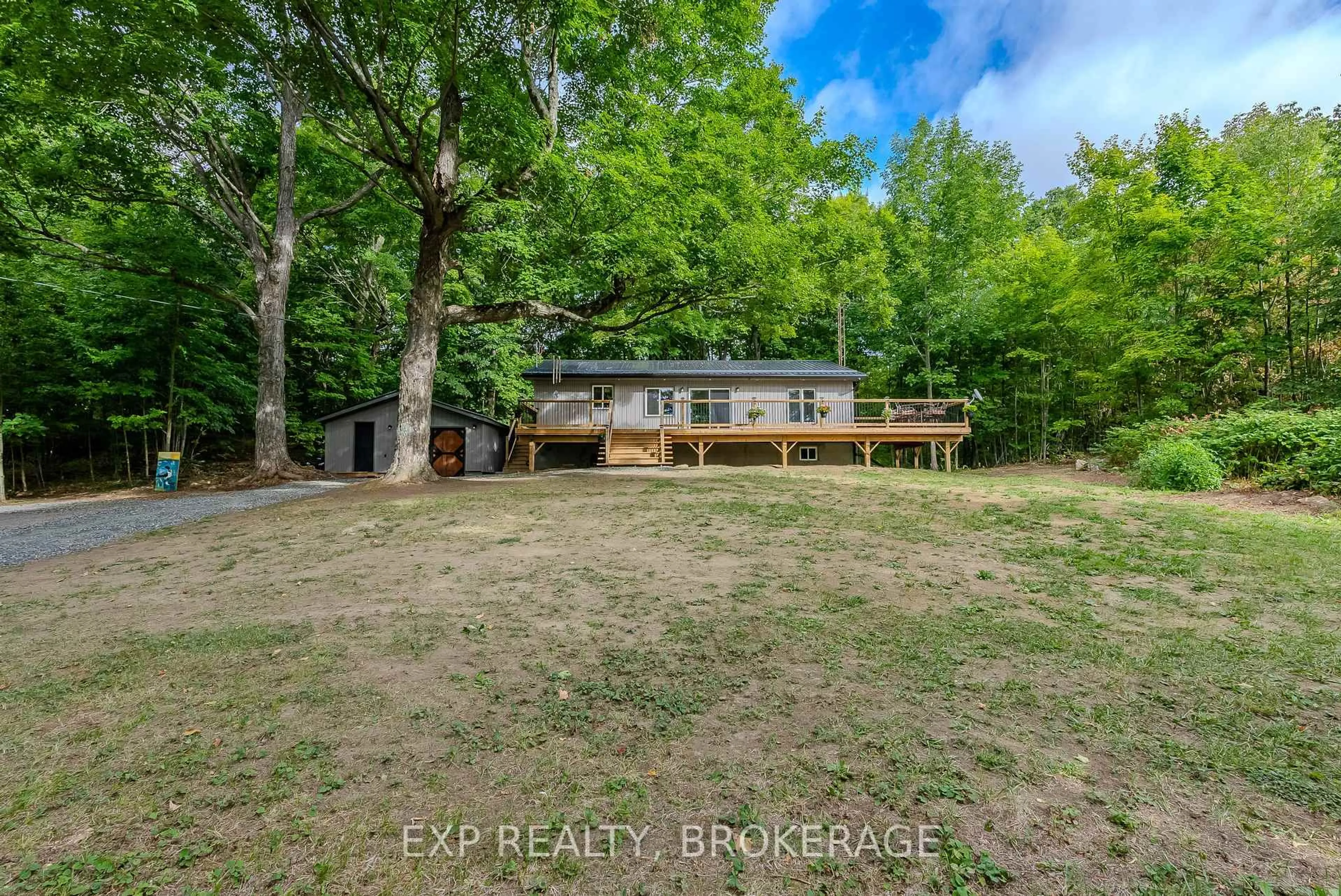 A pic from outside/outdoor area/front of a property/back of a property/a pic from drone, water/lake/river/ocean view for 6187 Arden Rd, Arden Ontario K0H 1B0