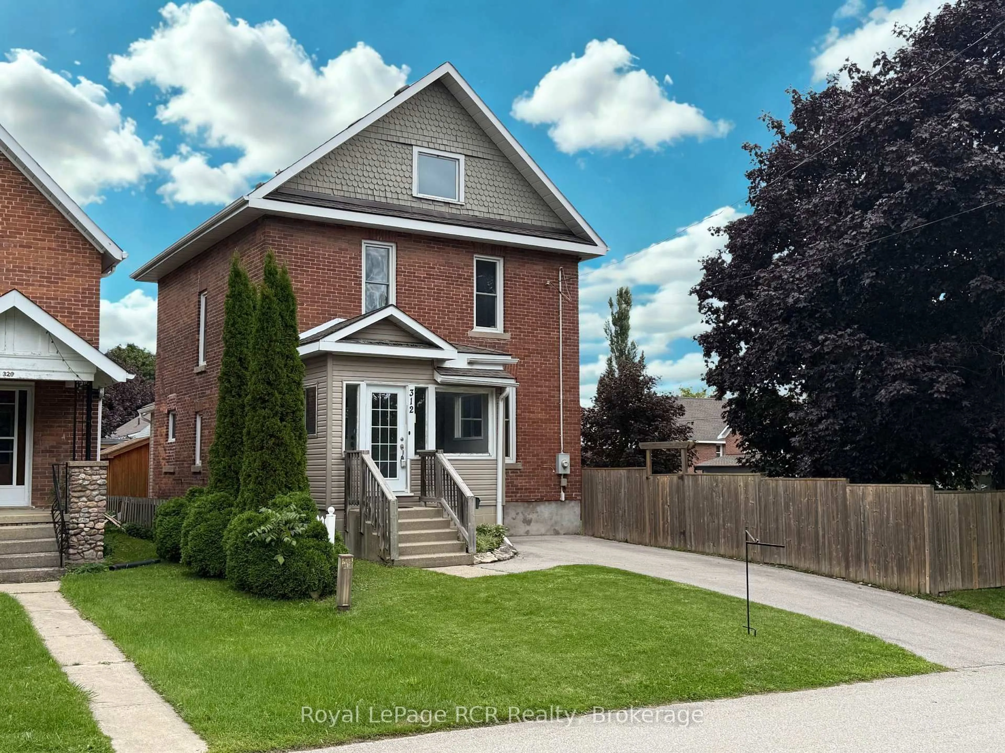 Home with brick exterior material, street for 312 18th St, Owen Sound Ontario N4K 4C1