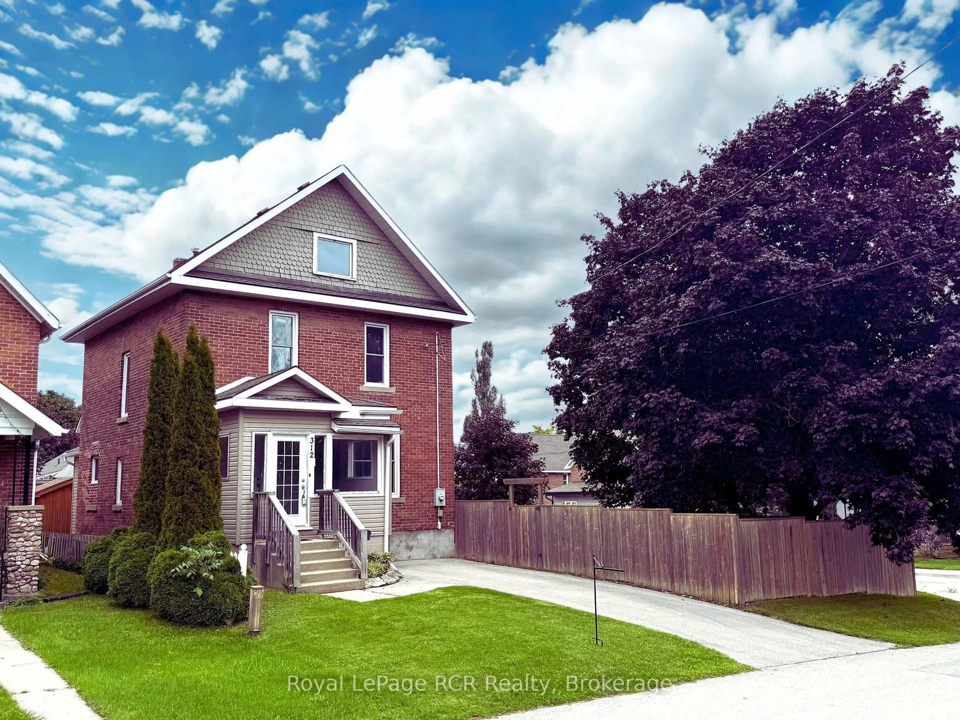 Home with brick exterior material, street for 312 18th St, Owen Sound Ontario N4K 4C1
