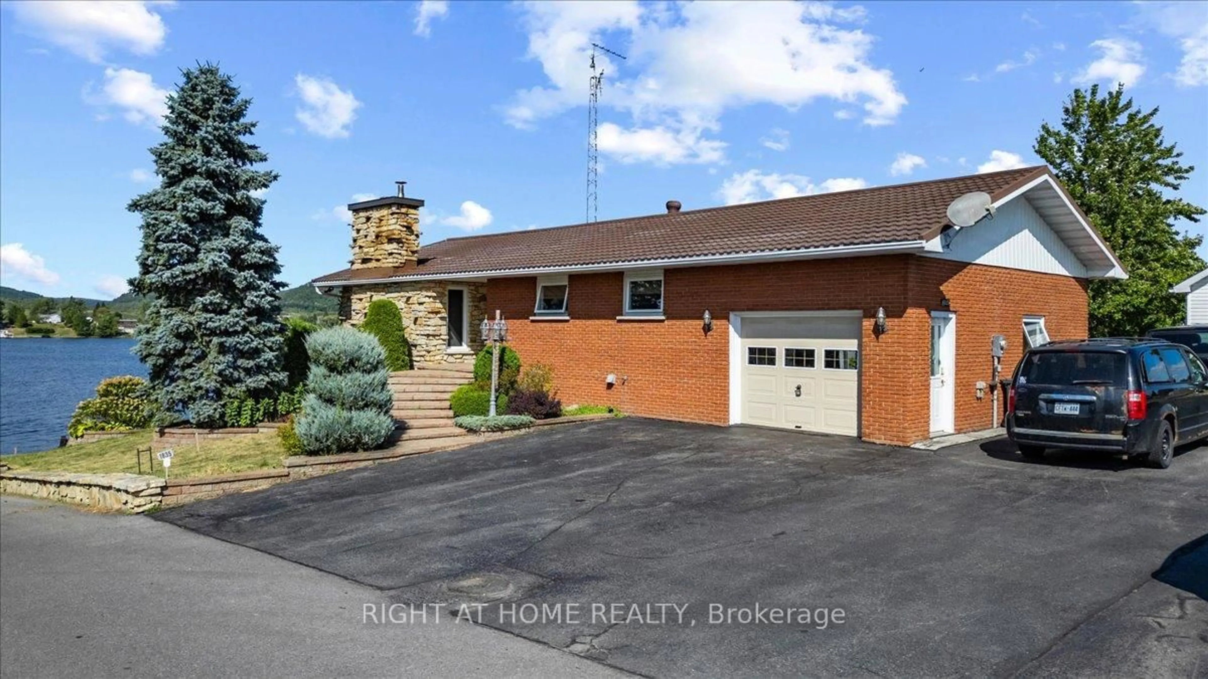 Home with brick exterior material, street for 1835 Ch. du Traversier St, Alfred and Plantagenet Ontario K0B 1J0