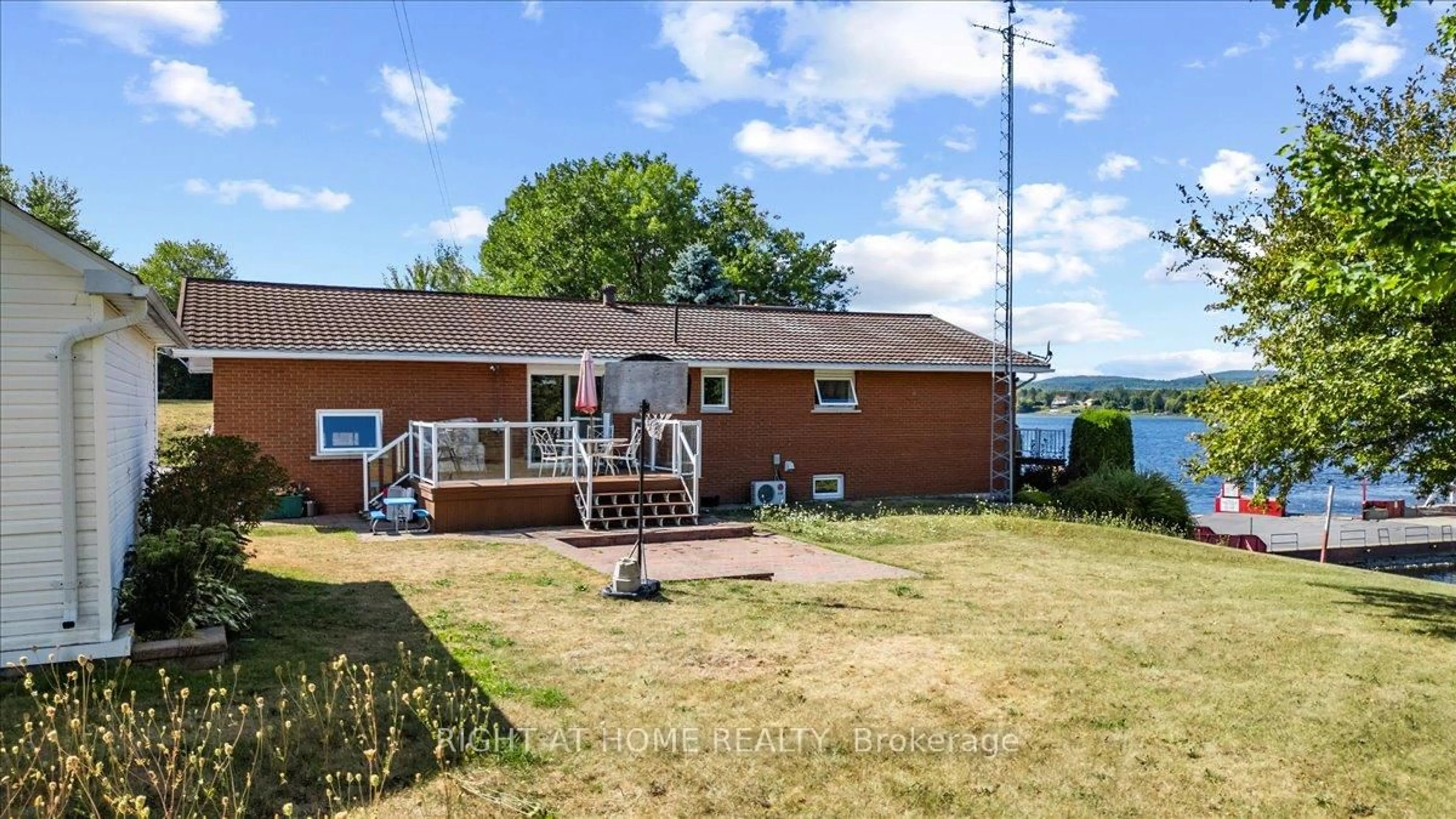 A pic from outside/outdoor area/front of a property/back of a property/a pic from drone, water/lake/river/ocean view for 1835 Ch. du Traversier St, Alfred and Plantagenet Ontario K0B 1J0