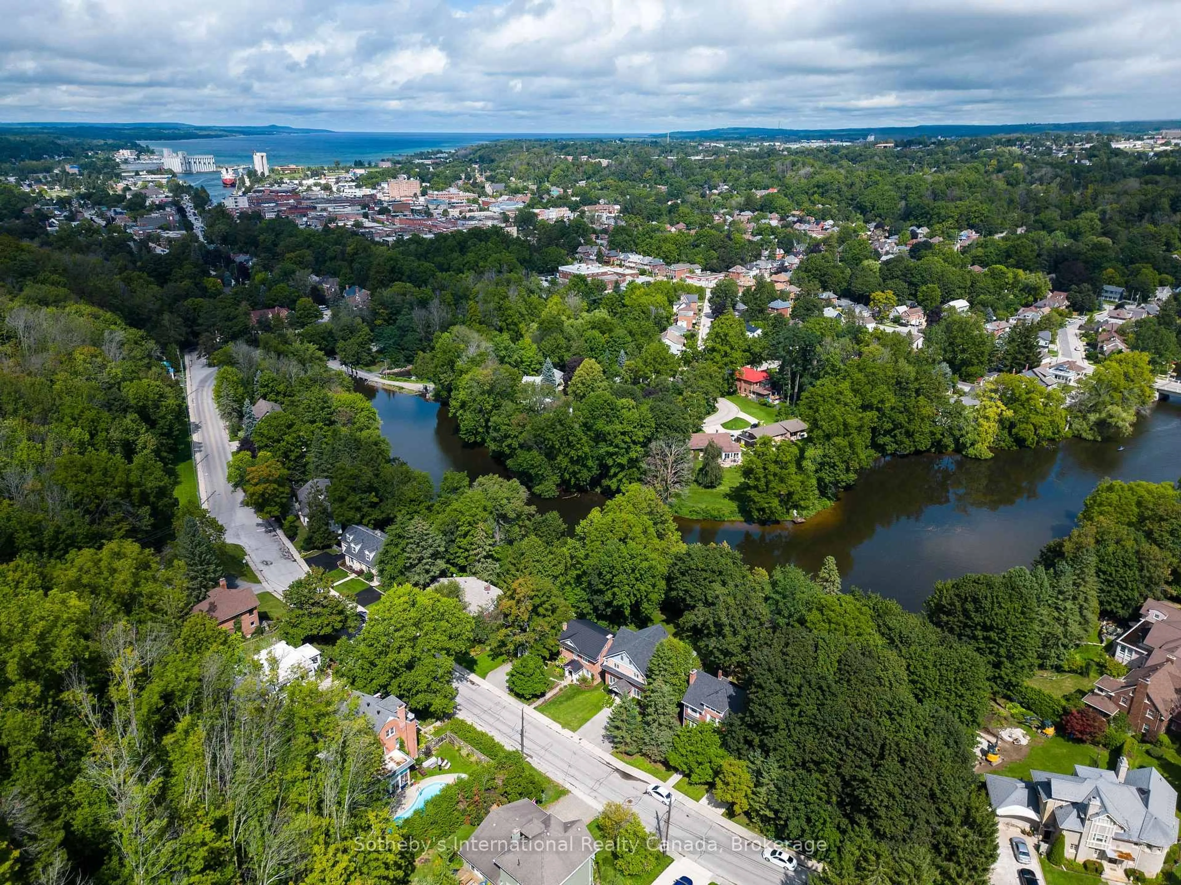 A pic from outside/outdoor area/front of a property/back of a property/a pic from drone, water/lake/river/ocean view for 457 2nd Ave, Owen Sound Ontario N4K 4L9