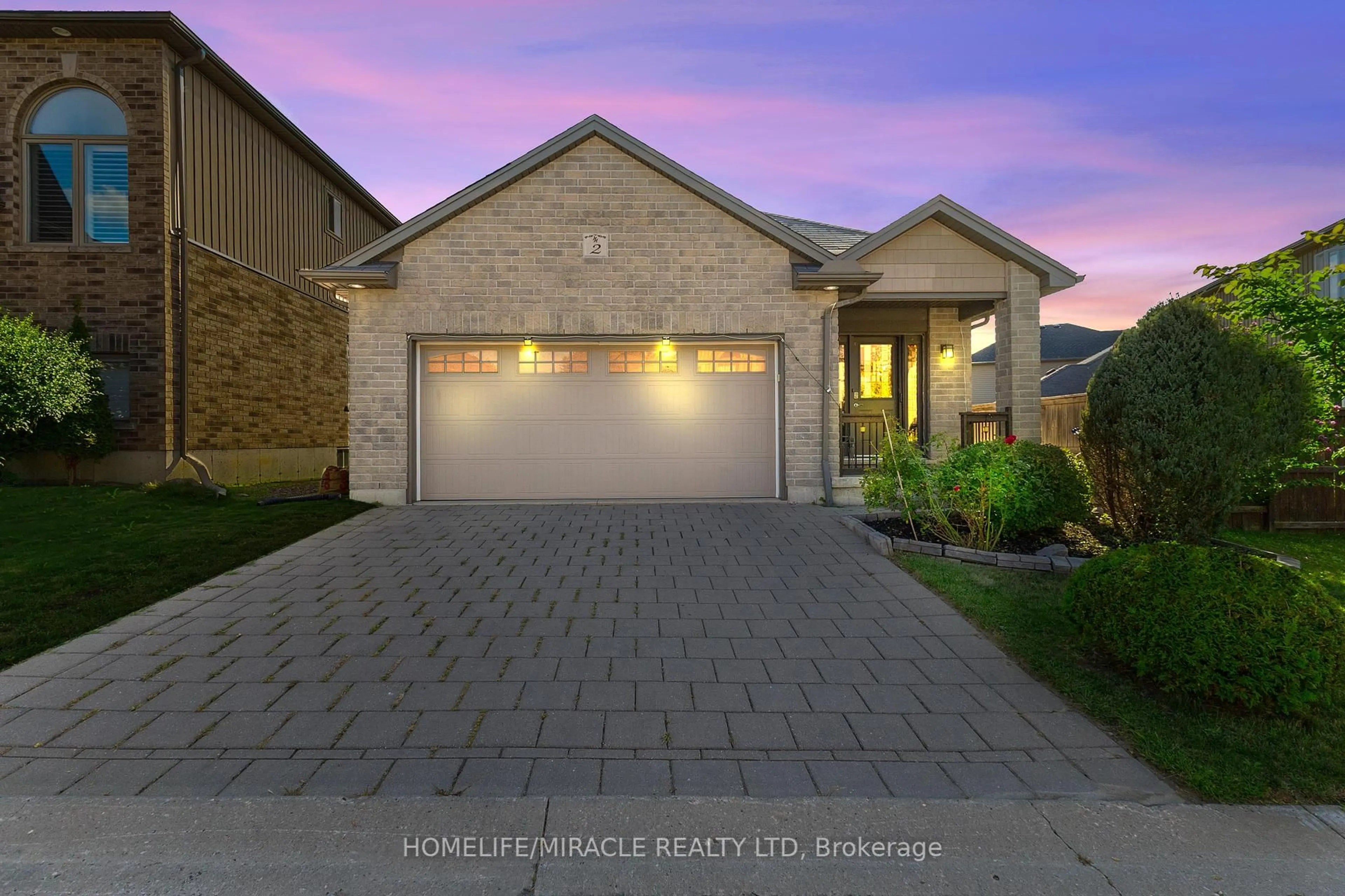 Home with brick exterior material, street for 70 Tanoak Dr #2, London North Ontario N6G 5R3