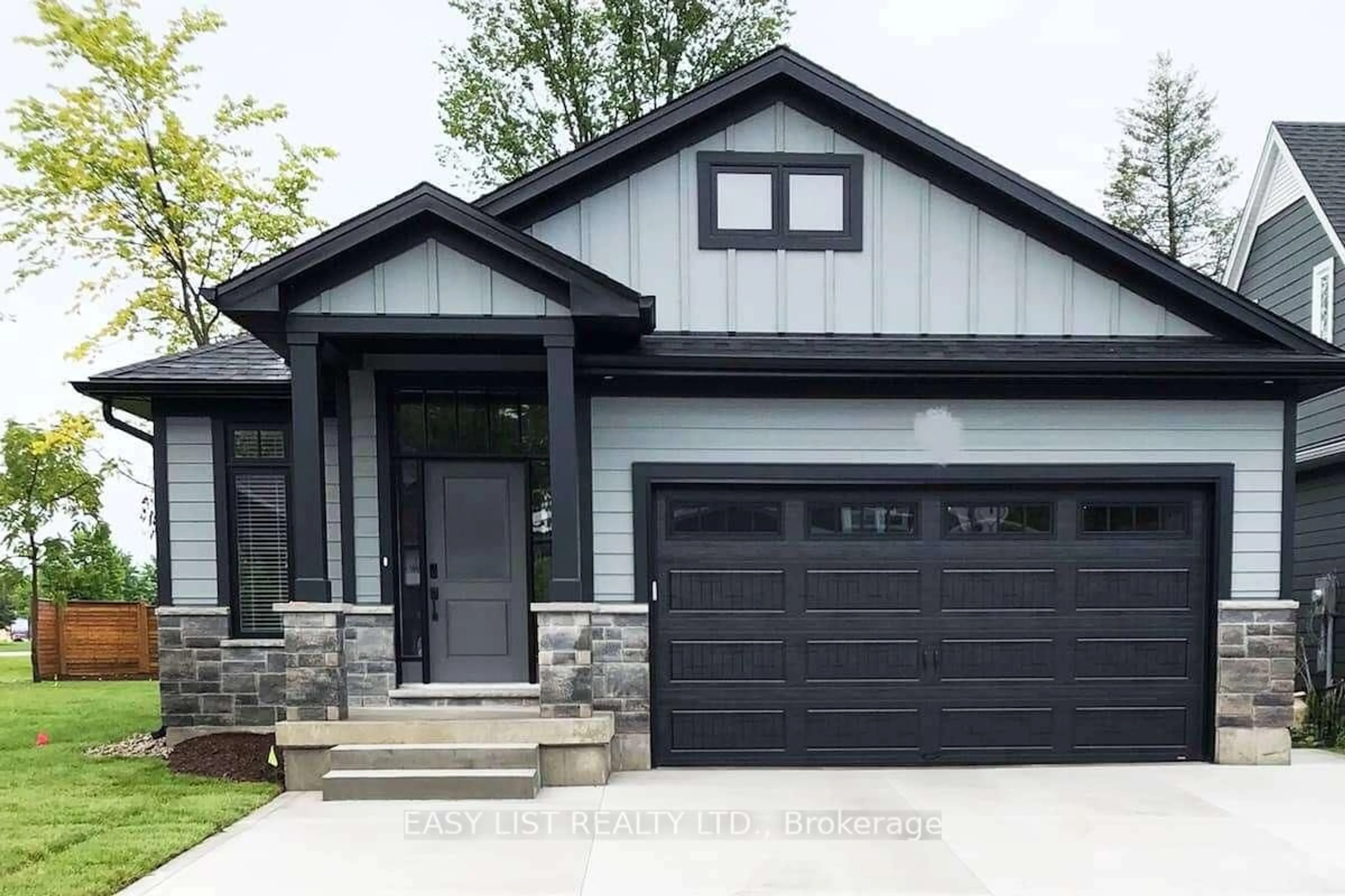 Home with vinyl exterior material, street for 2 Creek Side Pl, Lambton Shores Ontario N0M 1T0