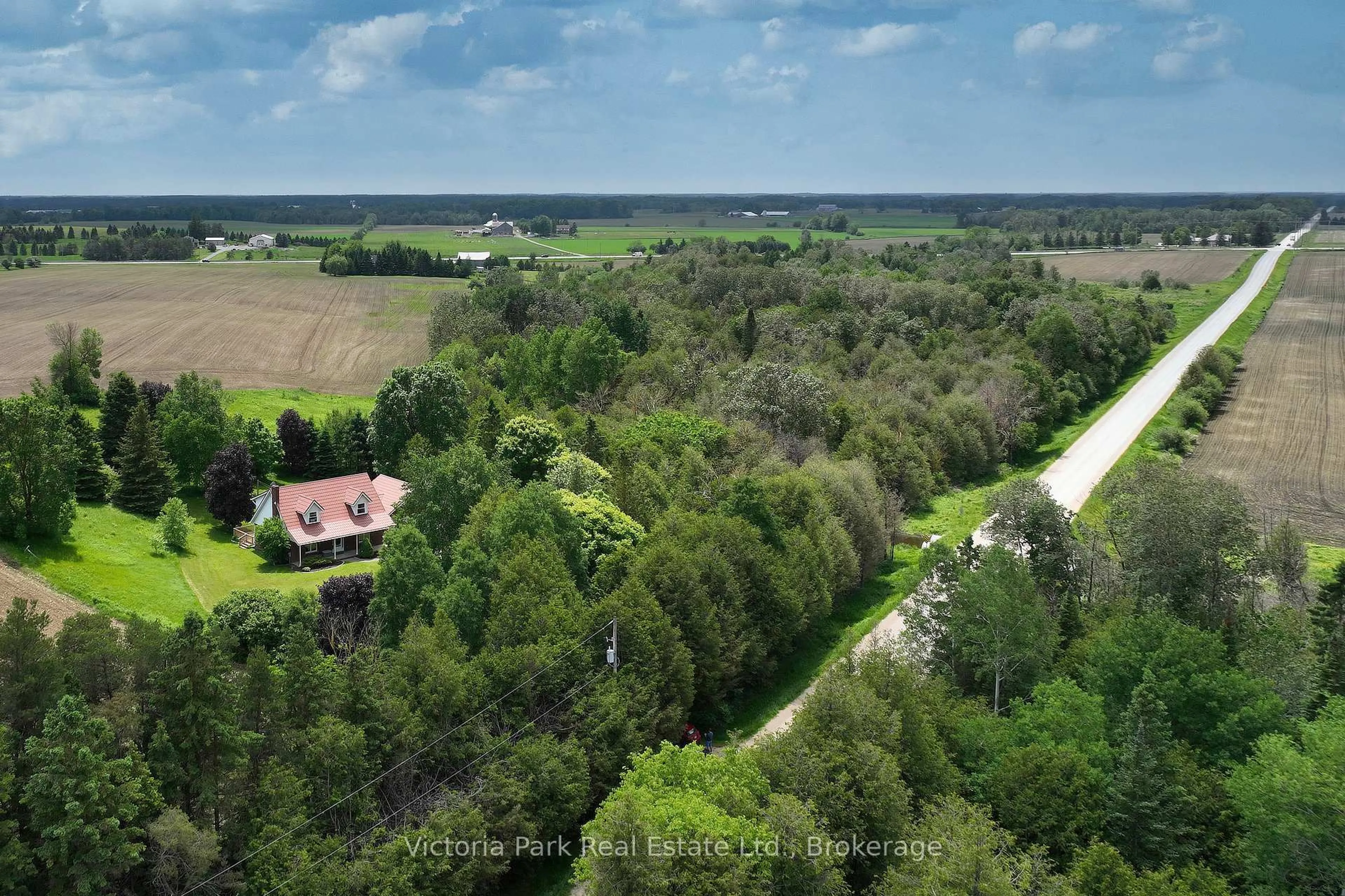 A pic from outside/outdoor area/front of a property/back of a property/a pic from drone, forest/trees view for 7135 3 Sdrd, Wellington North Ontario N0G 2L0