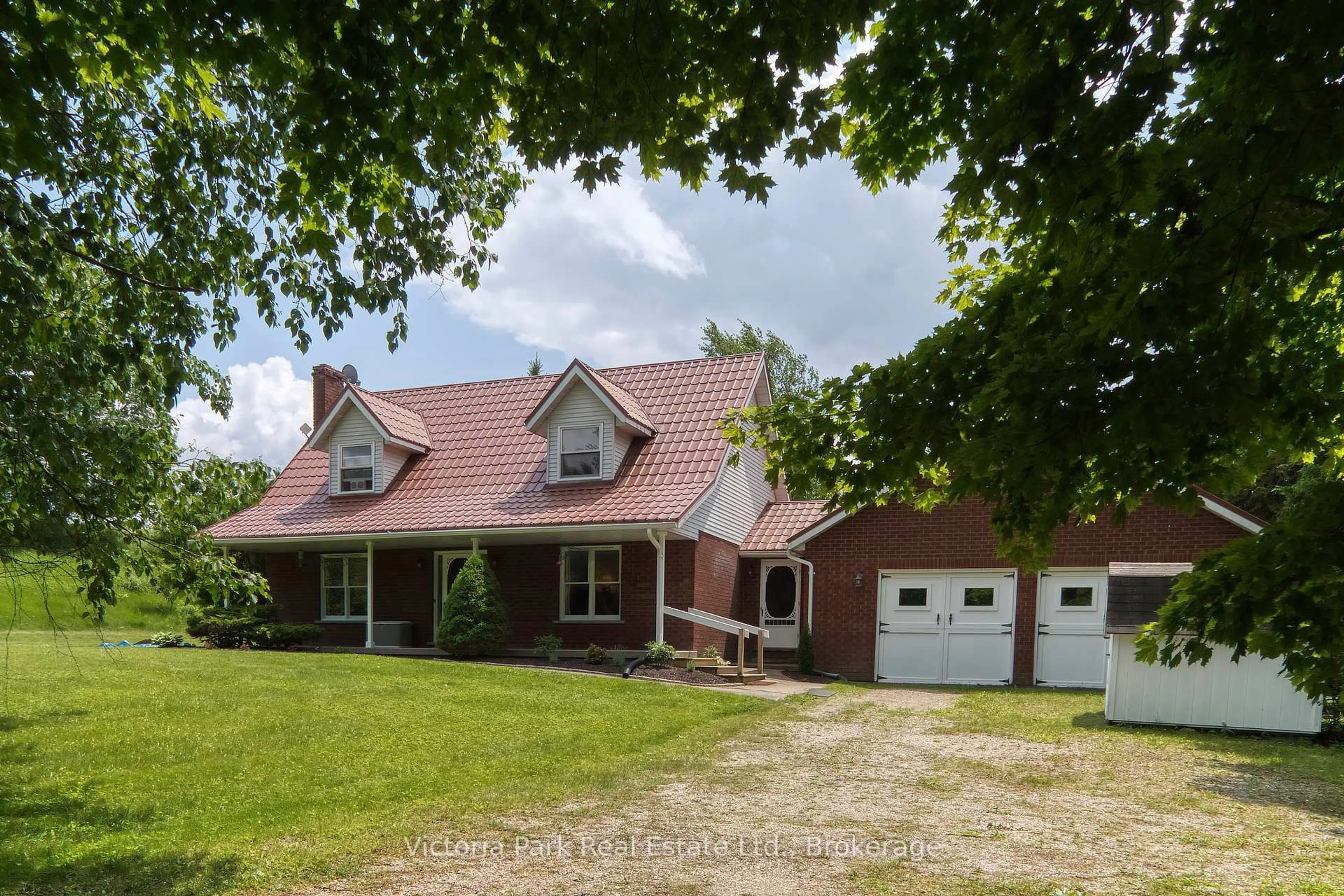 A pic from outside/outdoor area/front of a property/back of a property/a pic from drone, street for 7135 3 Sdrd, Wellington North Ontario N0G 2L0