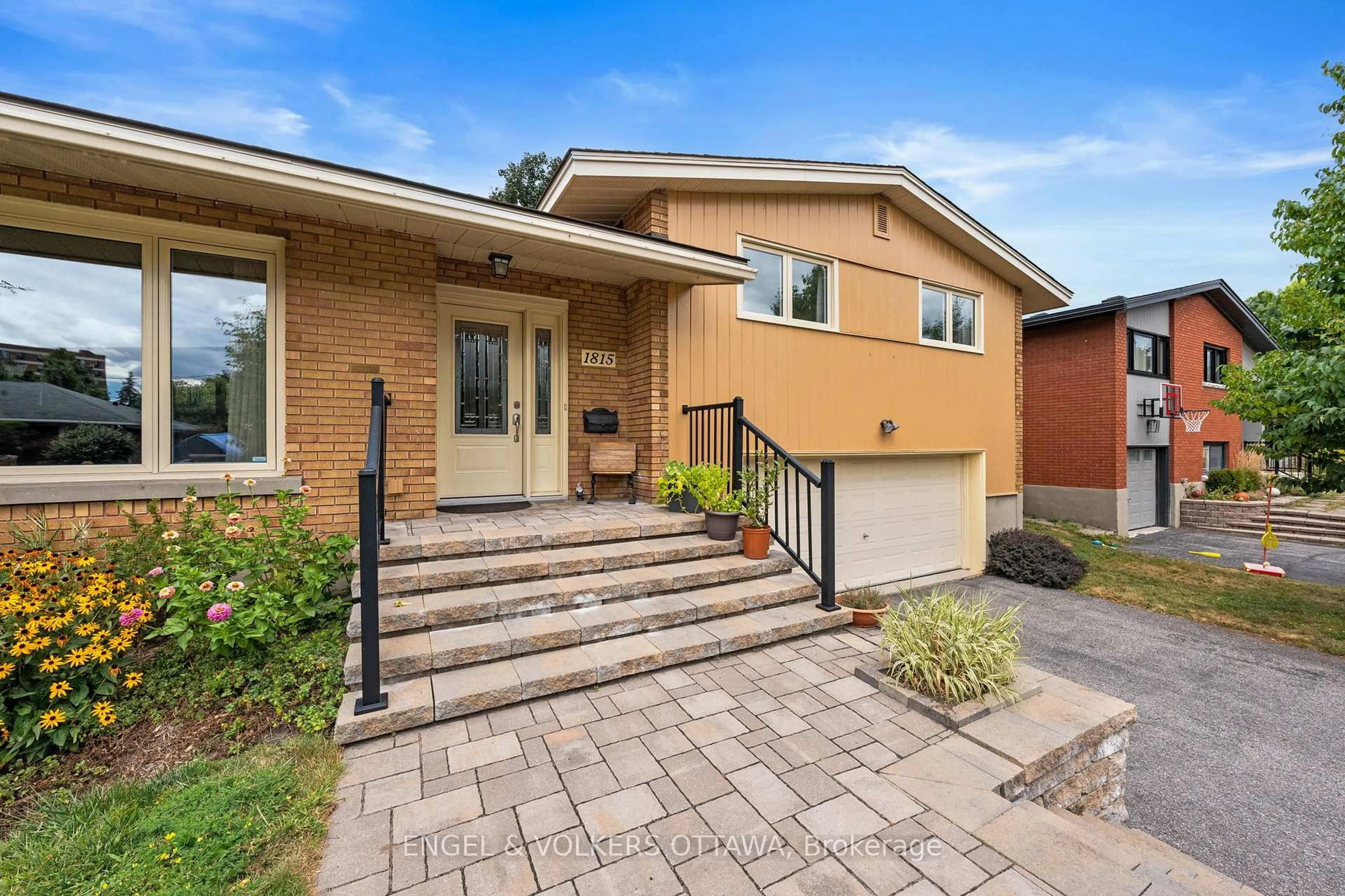 Home with brick exterior material, street for 1815 Paisley Ave, Ottawa Ontario K2C 1A7