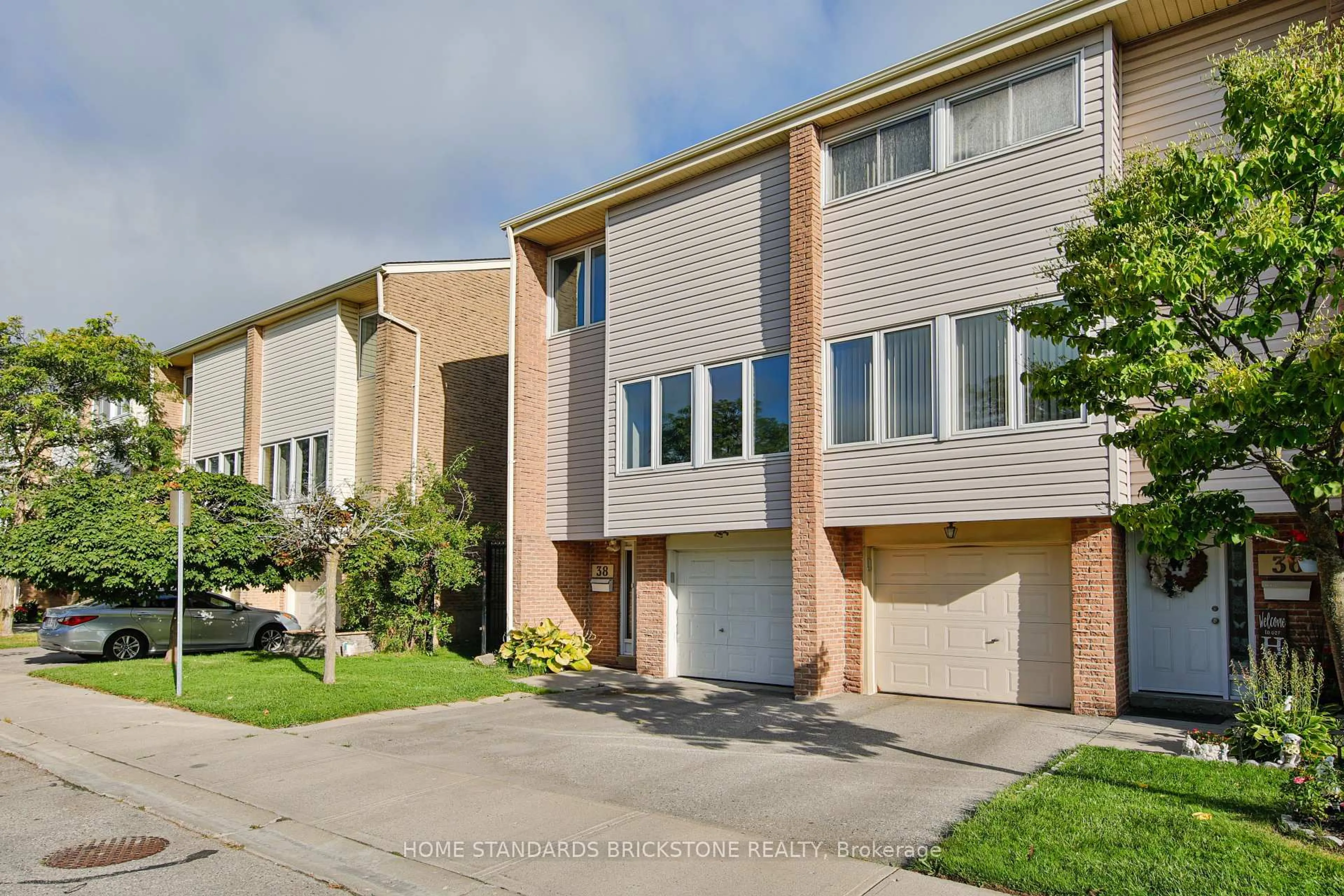Home with brick exterior material, street for 700 Osgoode Dr #38, London South Ontario N6E 2H1