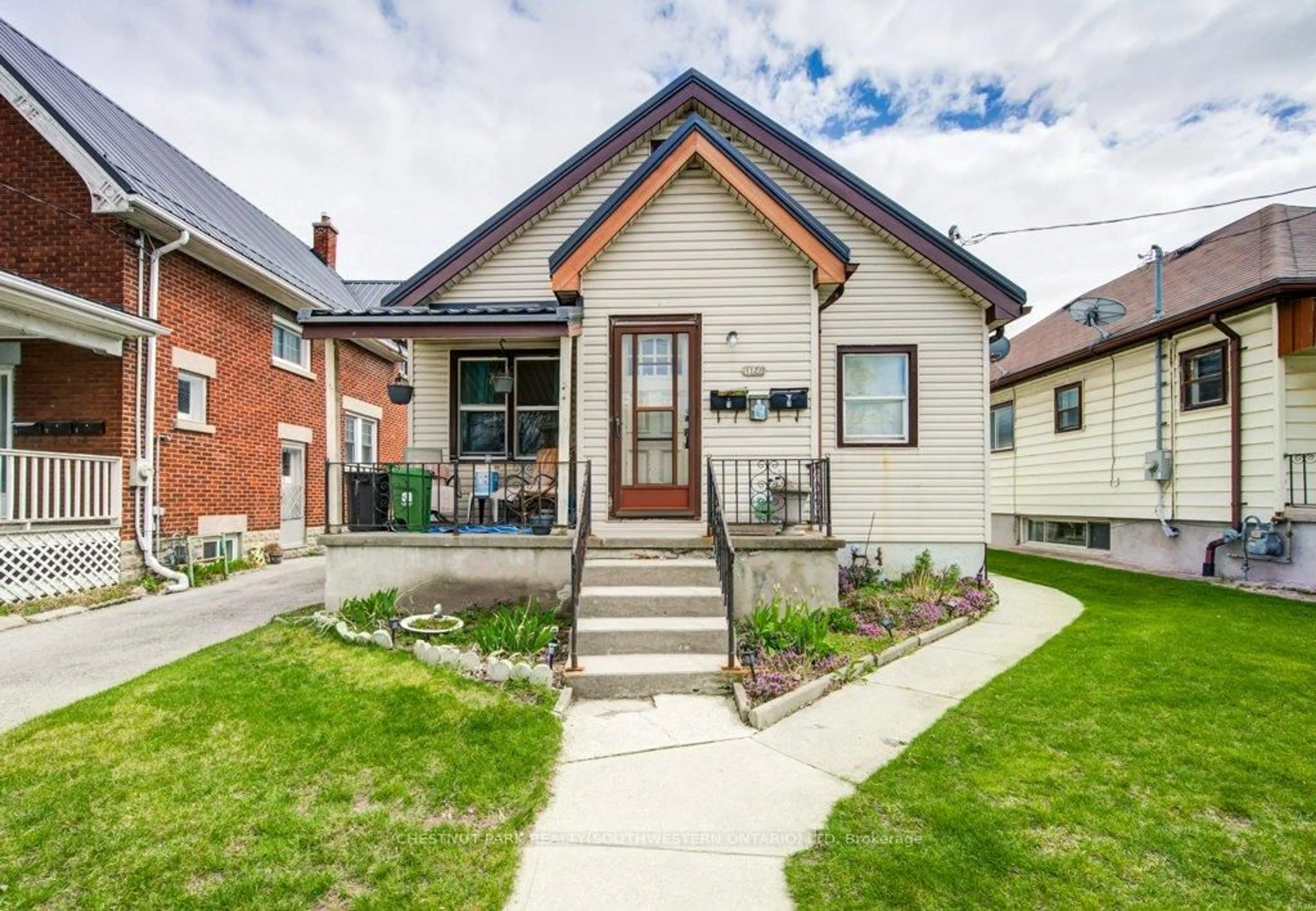 Home with brick exterior material, street for 1121 Trafalgar St, London East Ontario N5Z 1G9