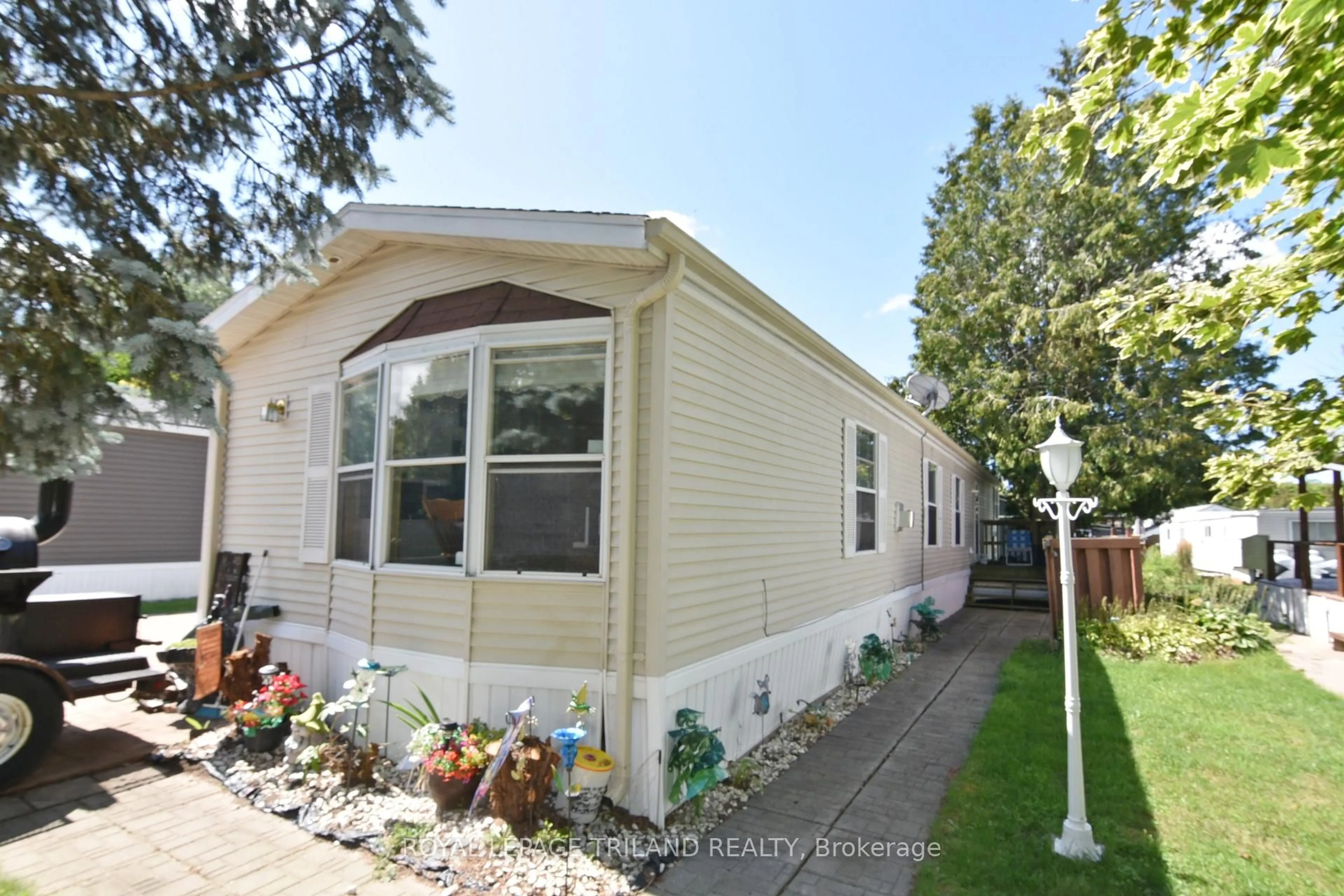Home with vinyl exterior material, street for 9385 Ipperwash Rd #7, Lambton Shores Ontario N0N 1J3